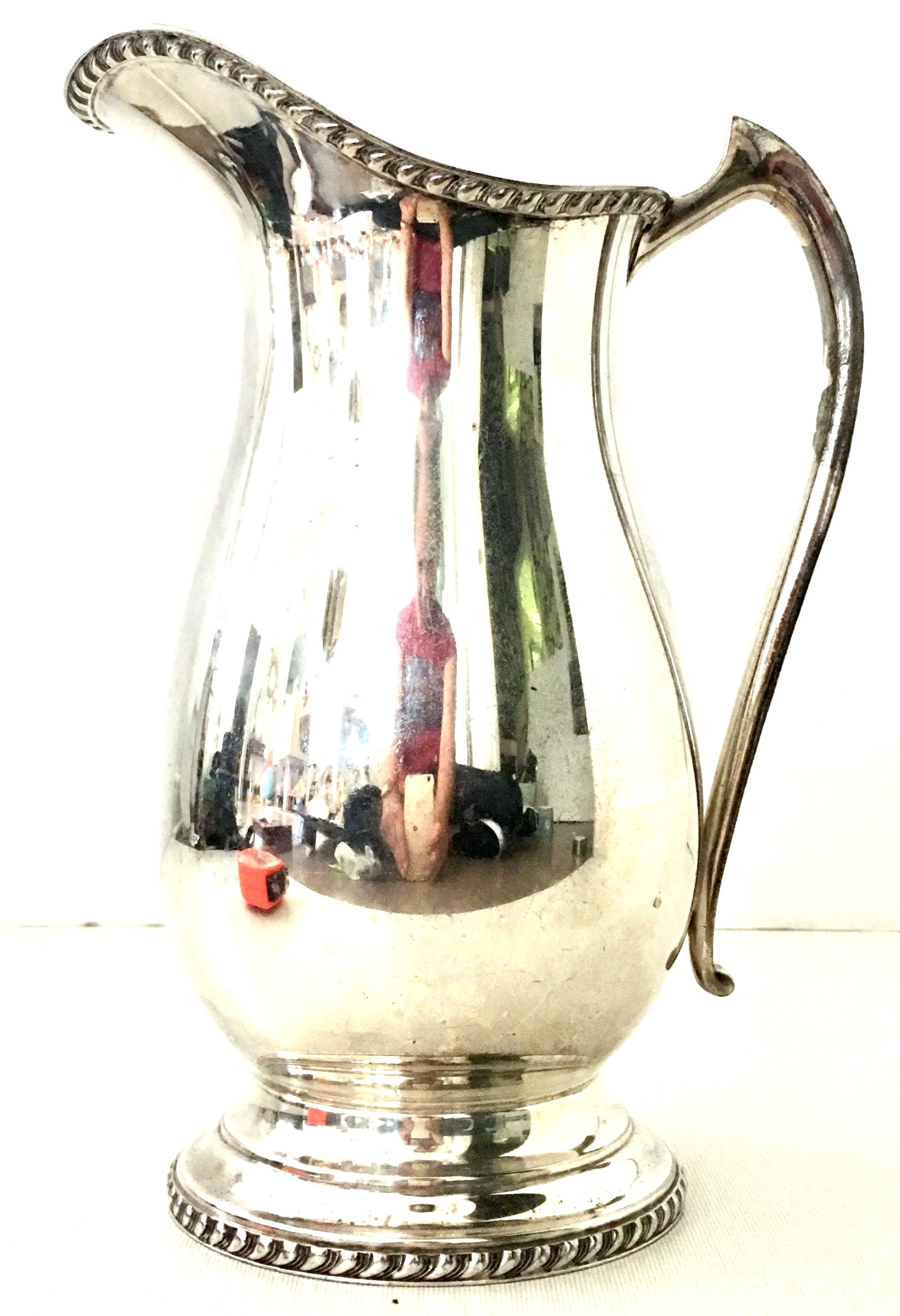 20th Century English silver plate beverage serving pitcher by, Bristol. Marked on the underside.