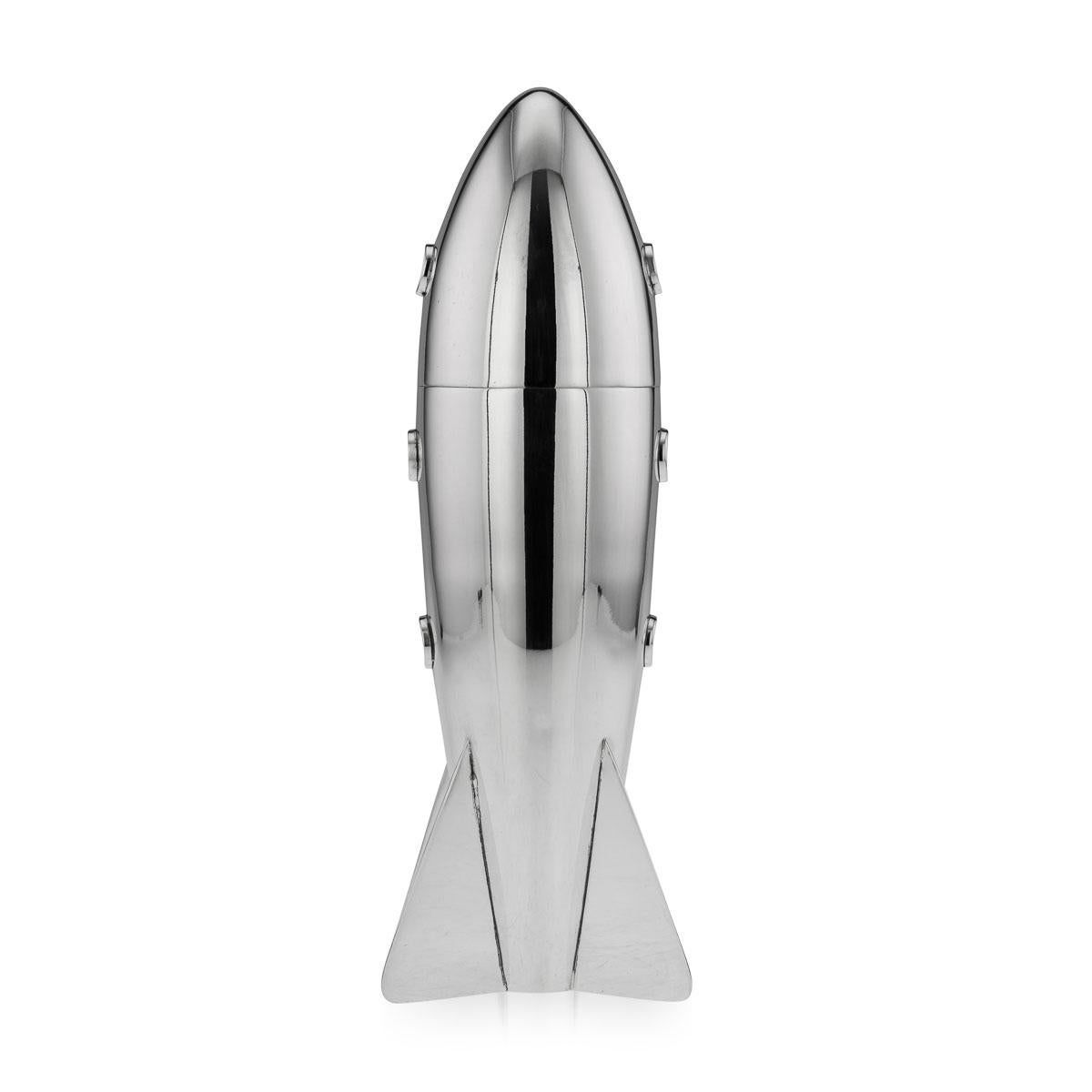A rare cocktail shaker made in England around the middle of the 20th century. As the space exploration era gripped the world’s imagination, all sorts of space related memorabilia was being produced. Novelty items like this cocktail shaker fashioned