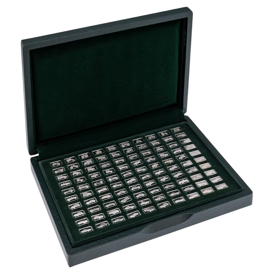 20th Century English Solid Silver "100 Greatest Cars" Cased Ingots & Book