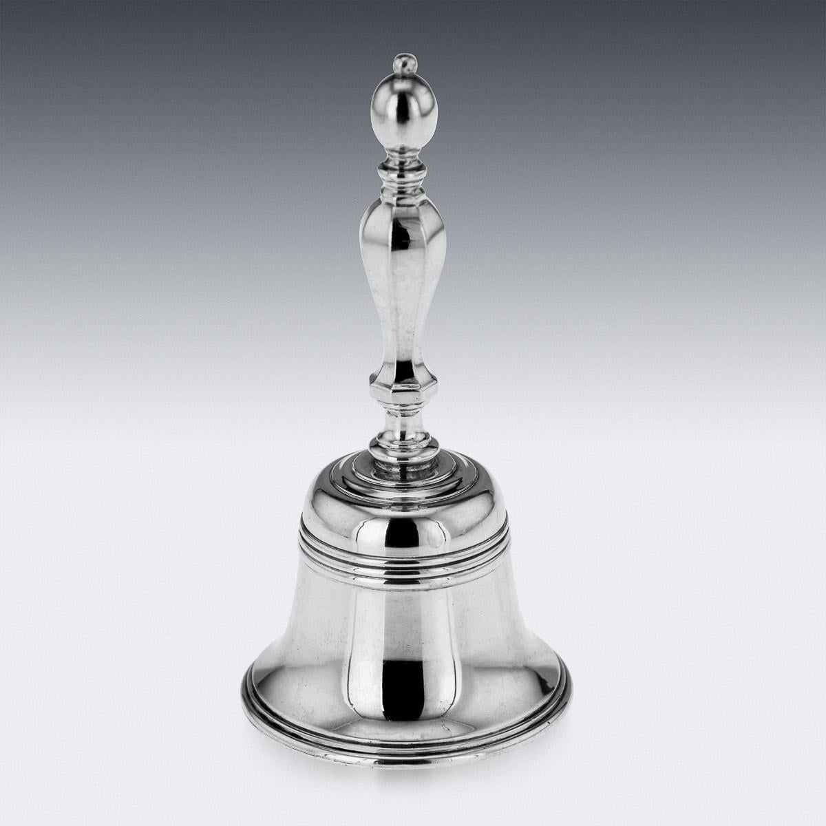 A superb 20th Century English solid silver desk or dinner bell. The bell, of a heavy guage, has a beaded body and beautifully shaped handle. This is the perfect addition to the drinks trolley, office, or dining table. Directly copying the form of