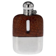 Petaca inglesa del siglo XX de plata maciza y cuero, Sheffield, c.1939