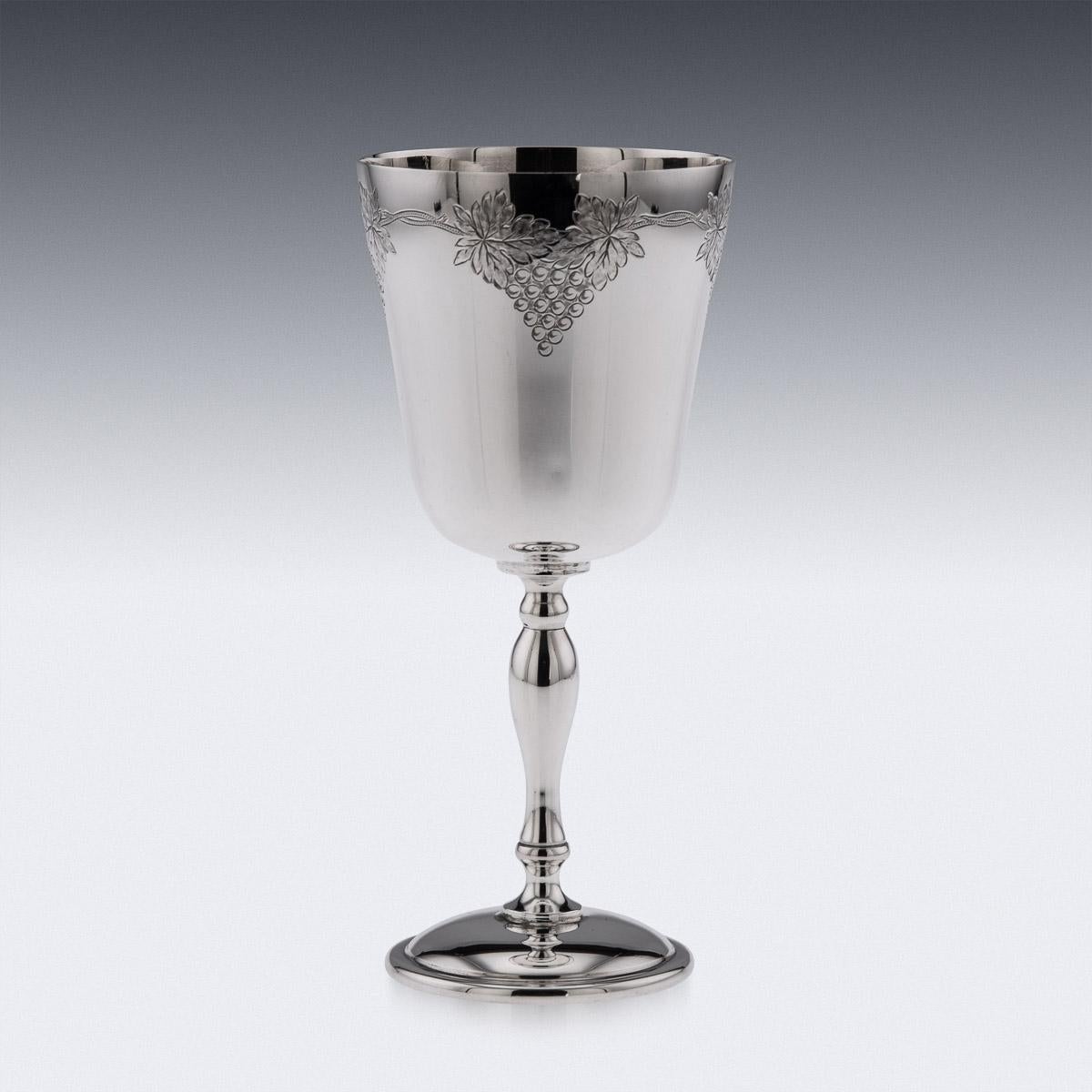 20th Century English silver set of 6 wine goblets, elegant size and weight, of traditional form, cast baluster shaped stem on a domed spreading foot, engraved with bunches of grapes and grapevine boarders.
Hallmarked English silver (925 Standard),