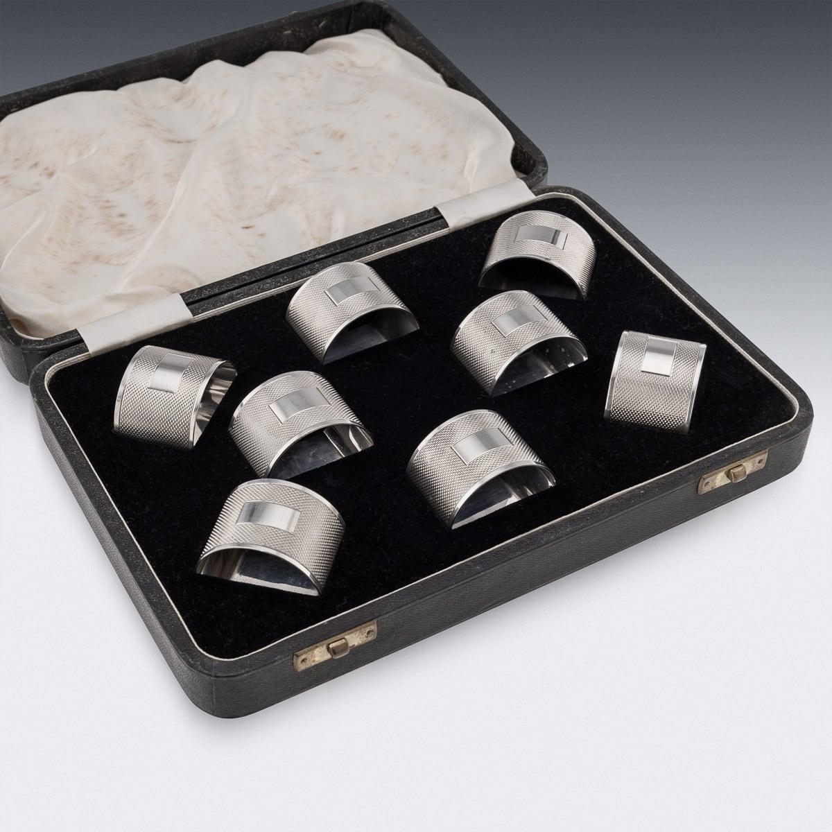 Britannique Ensemble de huit ronds de serviette anglais en argent massif du 20ème siècle, Viner's Ltd vers 1961 en vente