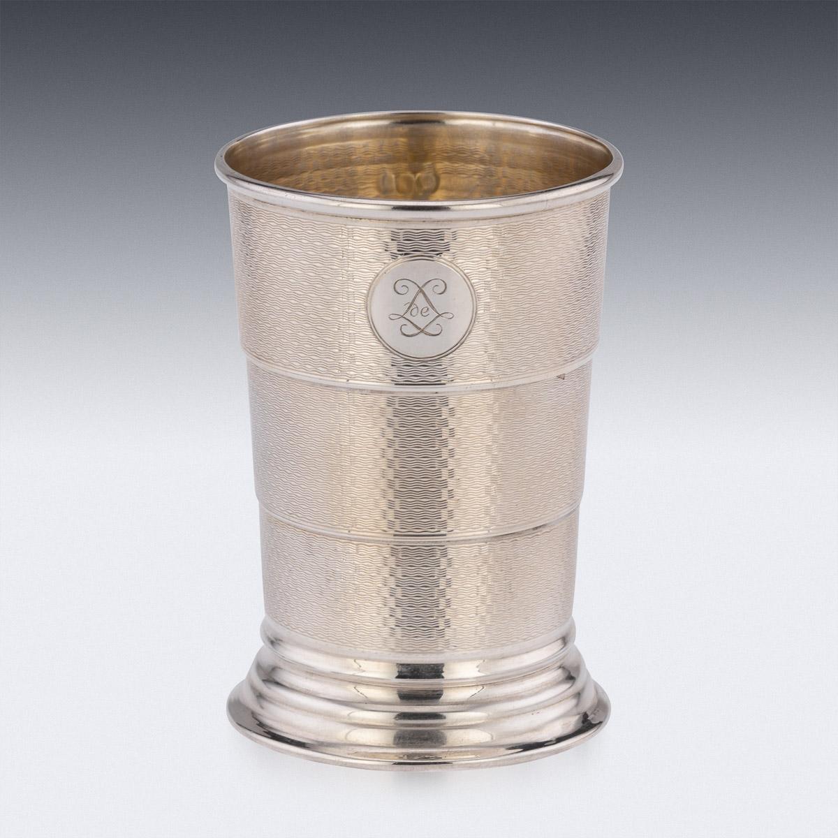 Antique 20th Century English solid silver telescopic beaker and a case, the beaker and case with engine turned decoration and richly gilded. The front of the beaker bearing initials. Hallmarked English silver (925 standard), London, year 1922 (g),