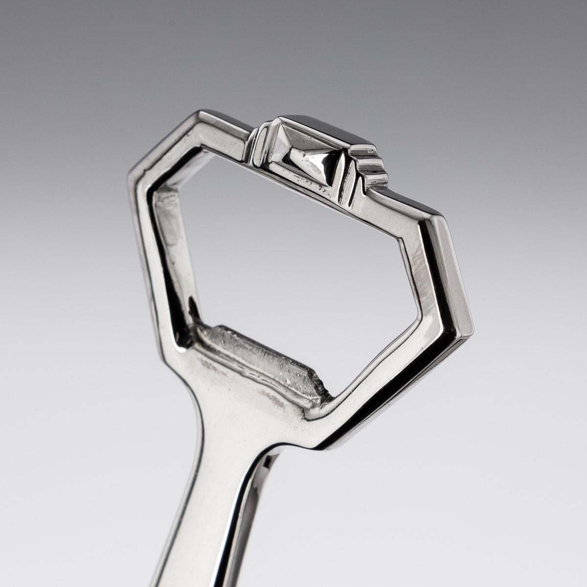 Sacacorchos y abrebotellas ingleses de plata maciza del siglo XX, c.1941 Silver en venta