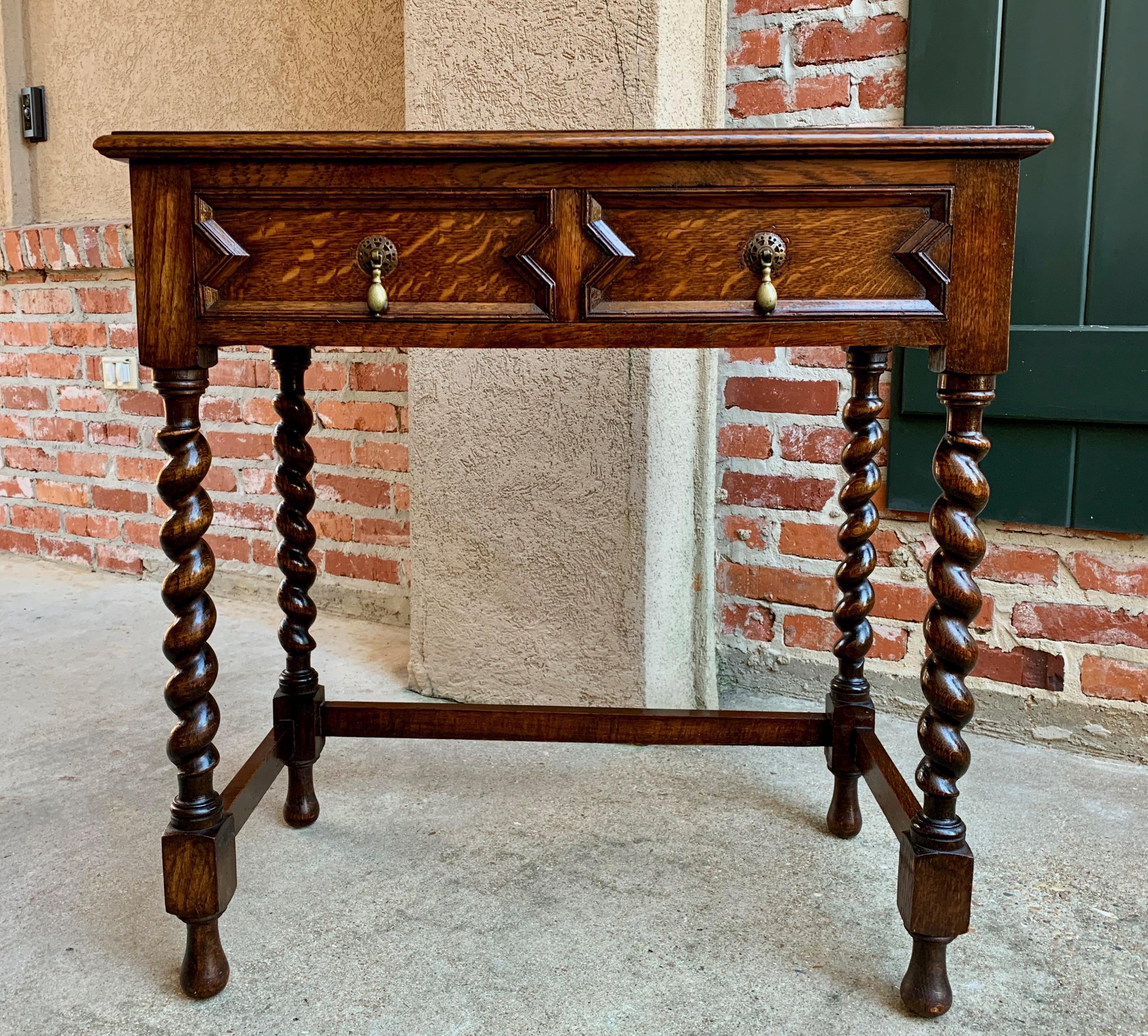 Direct from England, a lovely and versatile antique English tiger oak sofa table or desk!~
~Classic English barley twist legs (front and back) and venerable British style, certain to compliment any placement in your home!~
~Geometric, Jacobean