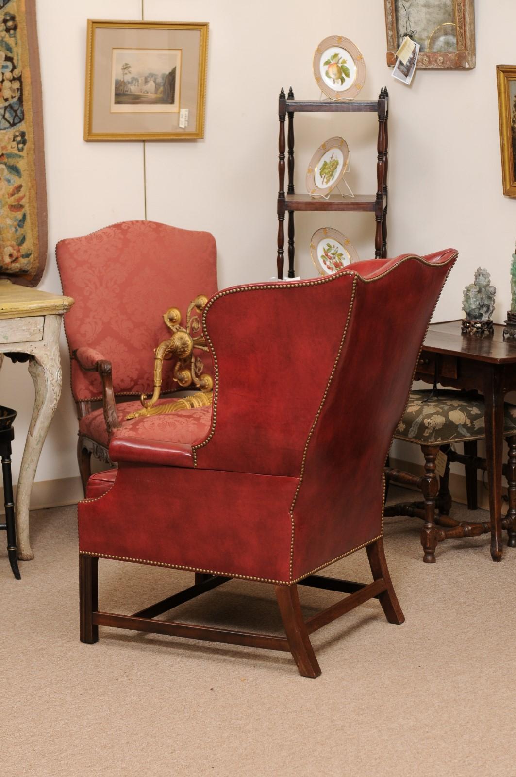20th Century English Wing Chair in Mahogany & Red Leather Upholstery with Brass  In Good Condition For Sale In Atlanta, GA
