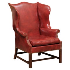 Antique 20th Century English Wing Chair in Mahogany & Red Leather Upholstery with Brass 