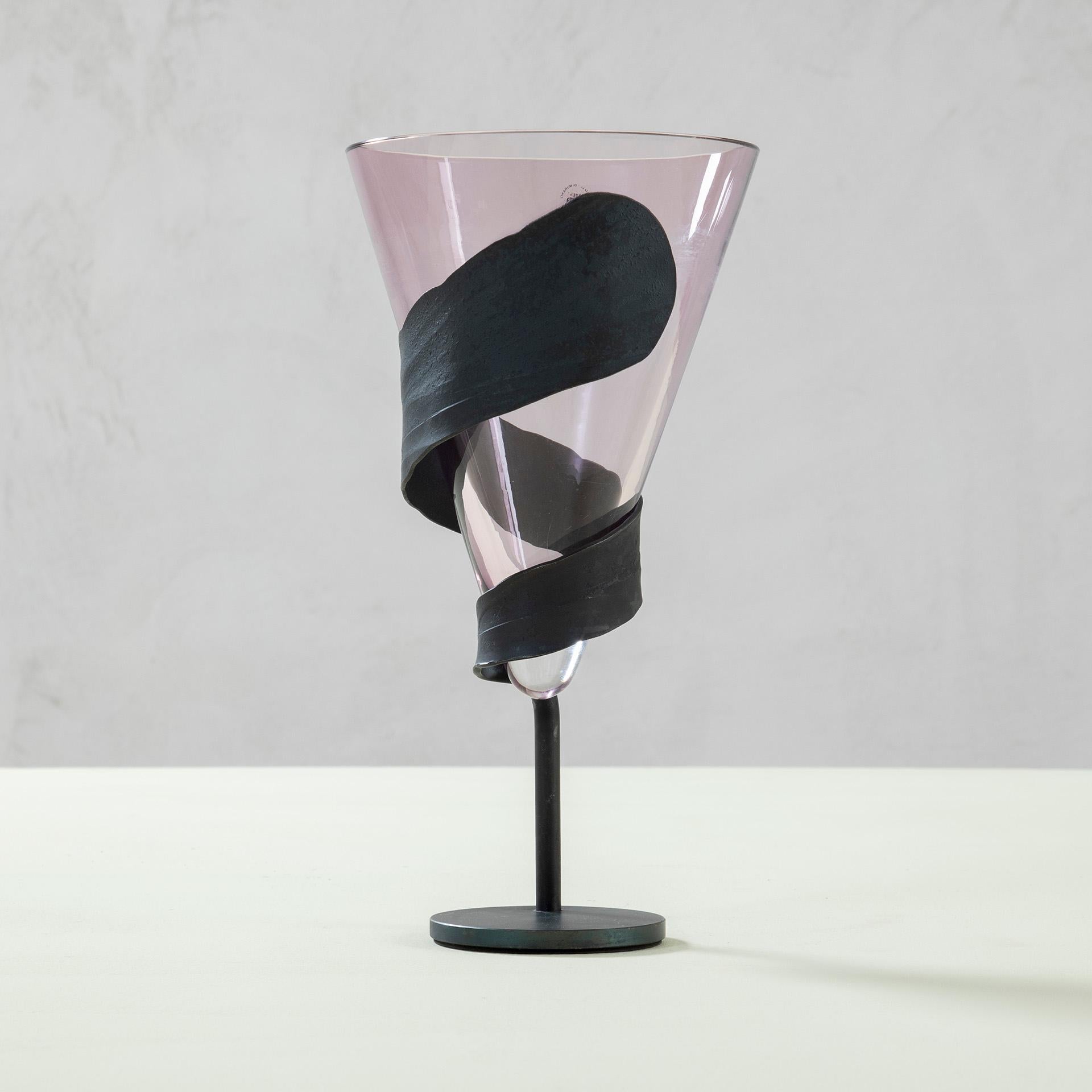 Enzo Mari was a noted Italian post-Modernist artist, writer, and product and furniture designer who incorporated ideas of the arts and crafts practices and of communism as an essential part of his design practice and philosophy opposing the idea