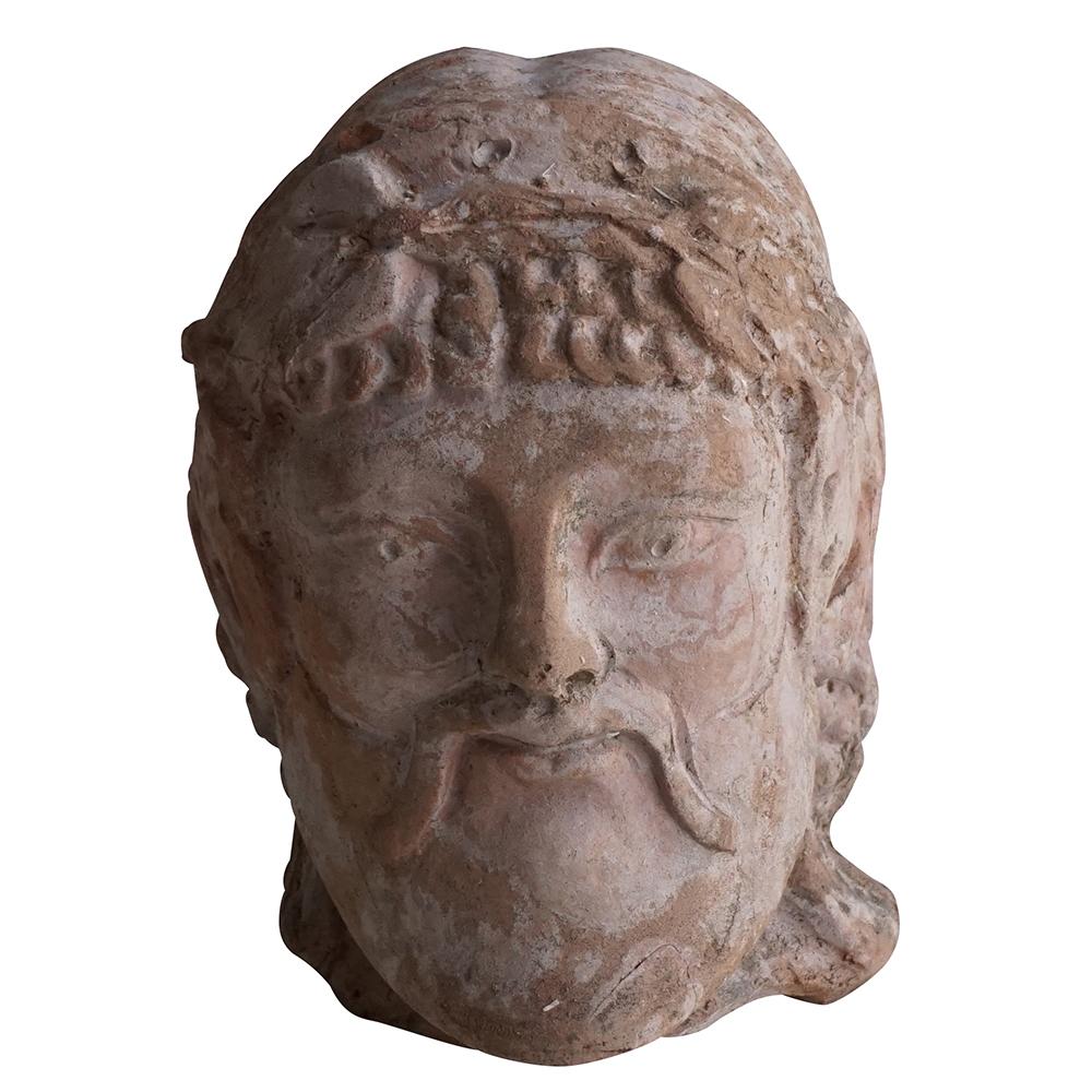 A vintage Tuscan clay head of Dionisio Etrusco Bacco made of hand crafted terra cotta, in good condition. Wear consistent with age and use, circa 1920, Italy.