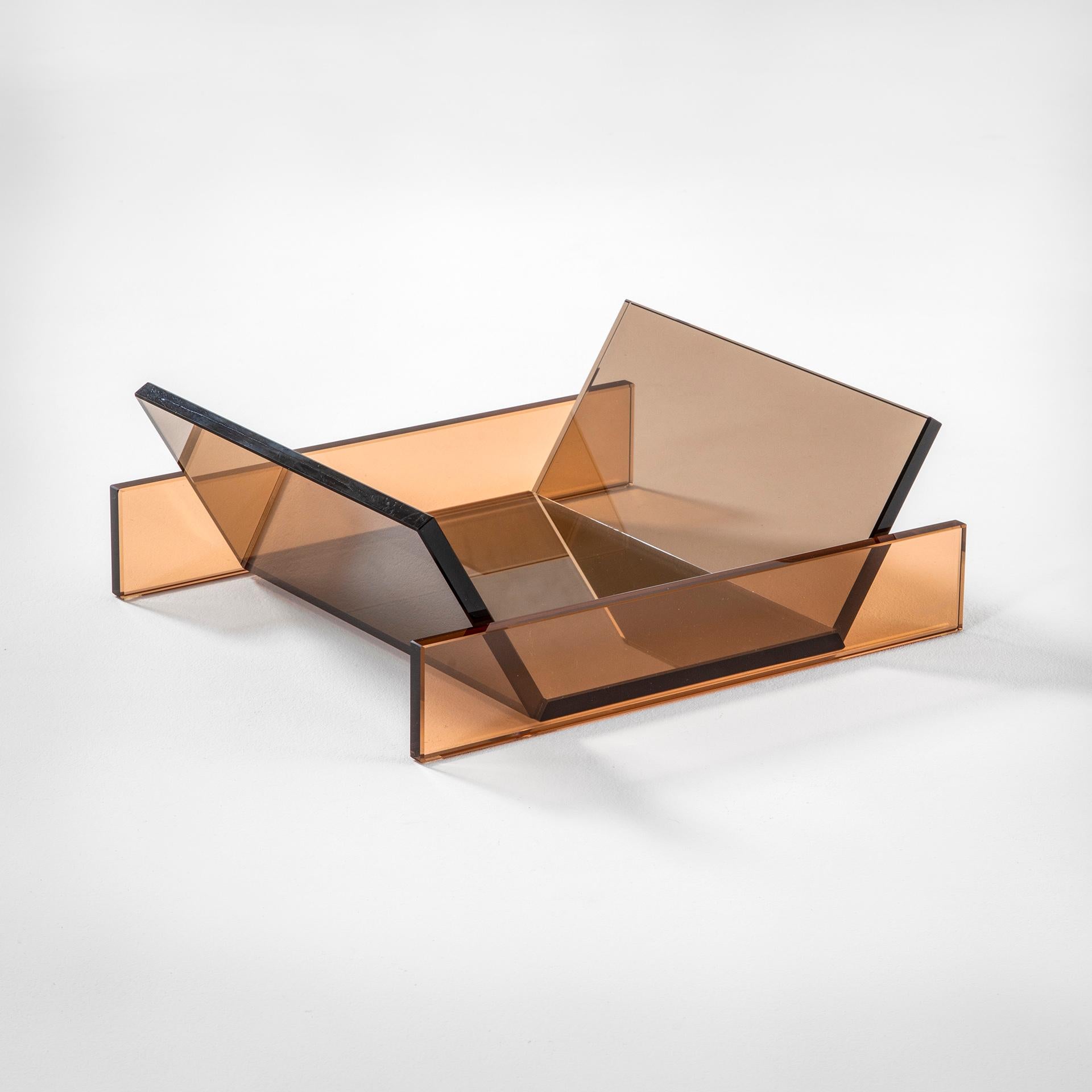 Ettore Sottsass grew up in Turin, and graduated in architecture from the Turin Polytechnic in 1939. In 1947, he founded his own studio in Milan. In 1956, Sottsass moved to New York where he began working in the studio of the designer George Nelson.