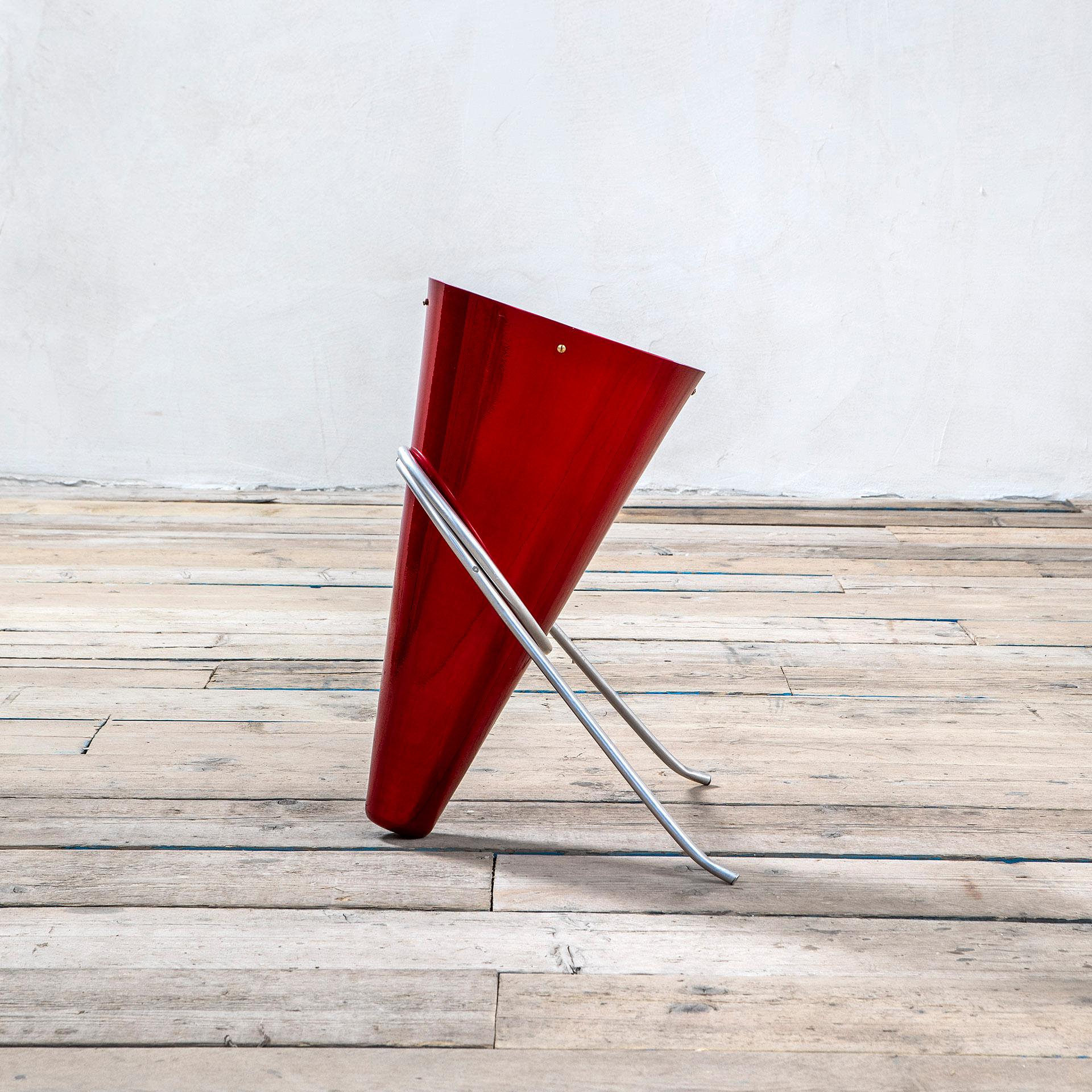 Umbrella standing designed by the master of Italian Design Ettore Sottsass, for the manufacturer Rinnovel in '70s. For Rinnovel, Sottsass designed different pieces, but this item is one of the most representative. The Umbrella Stand is in red