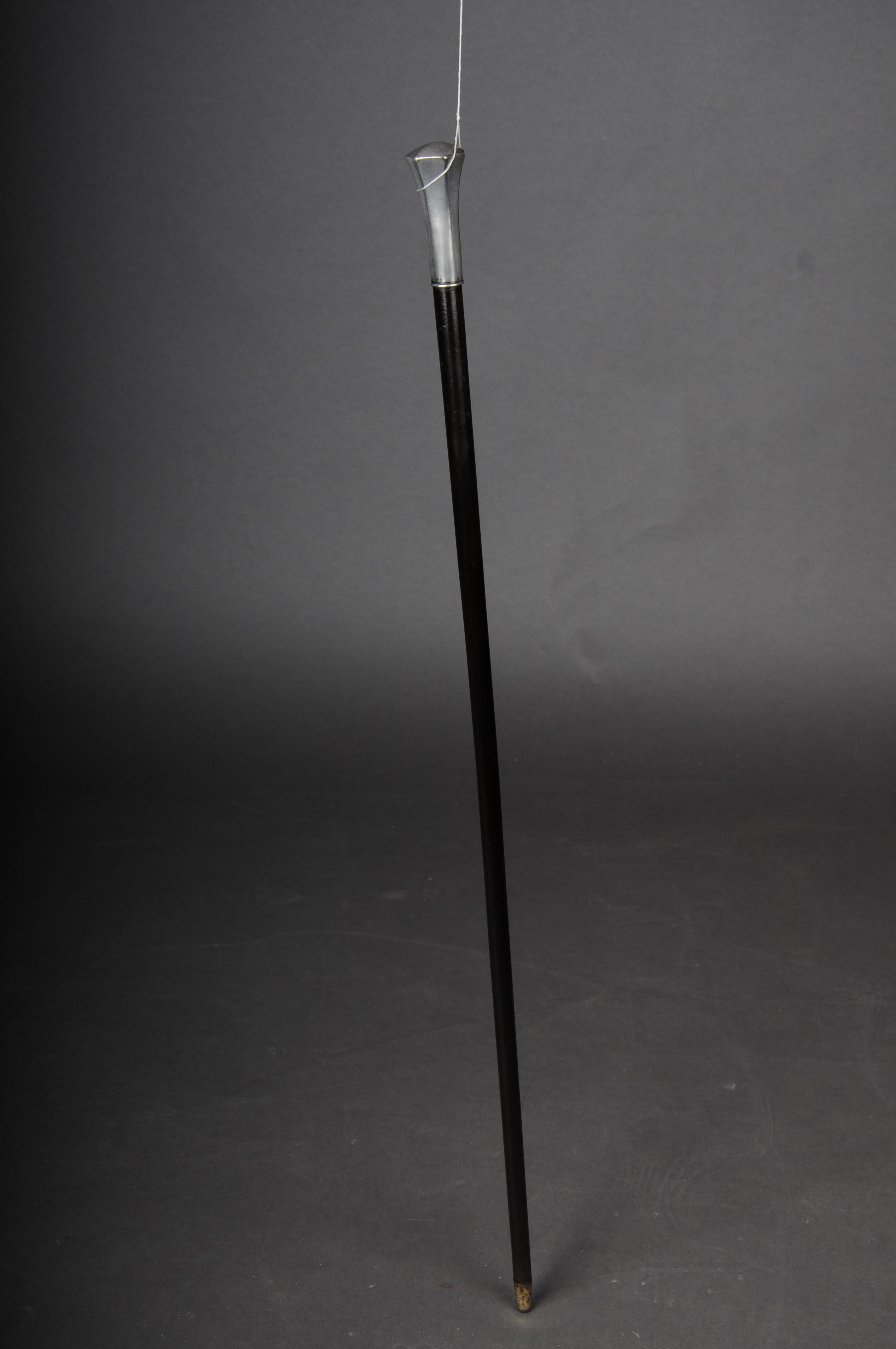 Timeless walking stick with handle 
silver plated handle.

