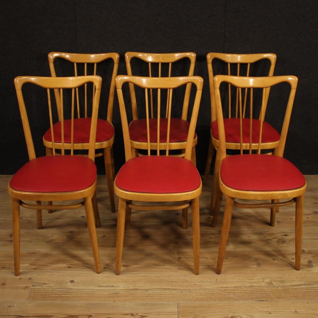 Group of Italian design chairs from the 1960s and 1970s. Exotic wood furniture with seats covered in faux leather. Six chairs of good solidity with faux leather covering showing defects (see photo) to be replaced. Furniture for antique dealers and