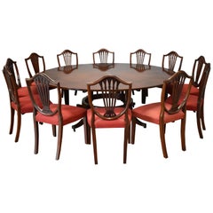 20th Century Extending Circular "Jupe" Style Dining Table and 12 Chairs