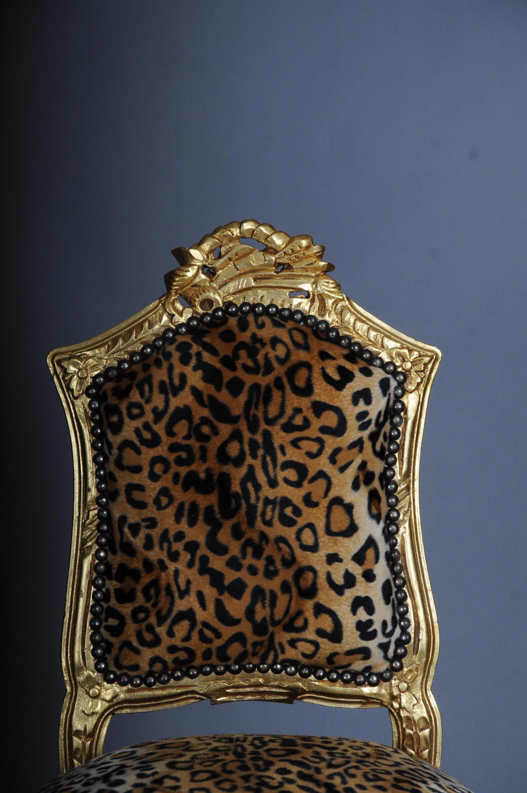20th century Fancy chair in Louis XV style, velvet leopard

Solid wood and gold frame. Bombed and carved frame on curved feet. Leopard velvet fabric cover.

(C-Mu-1).
