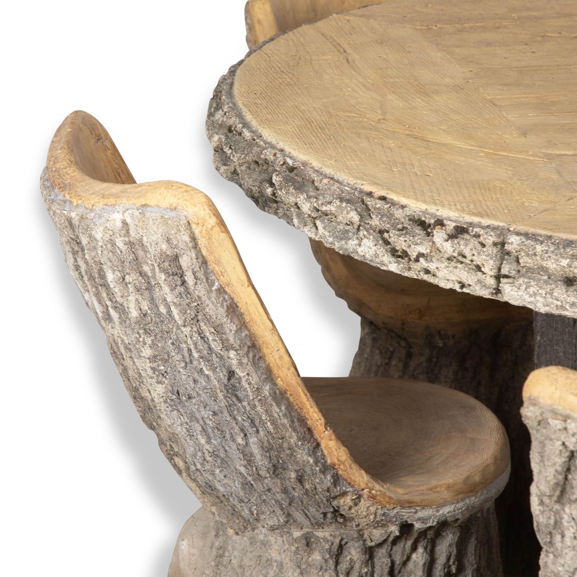 20th century wonderful french Faux Bois garden table and five chairs. 
The stone depicts a realistic tree bark with its true to life wonderful light ochre colour to depict the internal side of the tree. 
This unique garden set will be a great