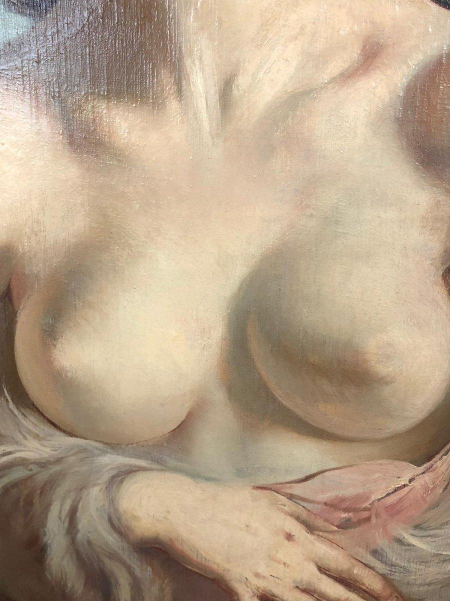 Tableau du 20e siècle représentant le portrait d'une jeune femme semi-habillée aux seins nus, huile sur toile signée par l'artiste Santho Maria.
D'une facture extraordinaire, le célèbre peintre parvient à rendre la beauté du modèle d'une manière