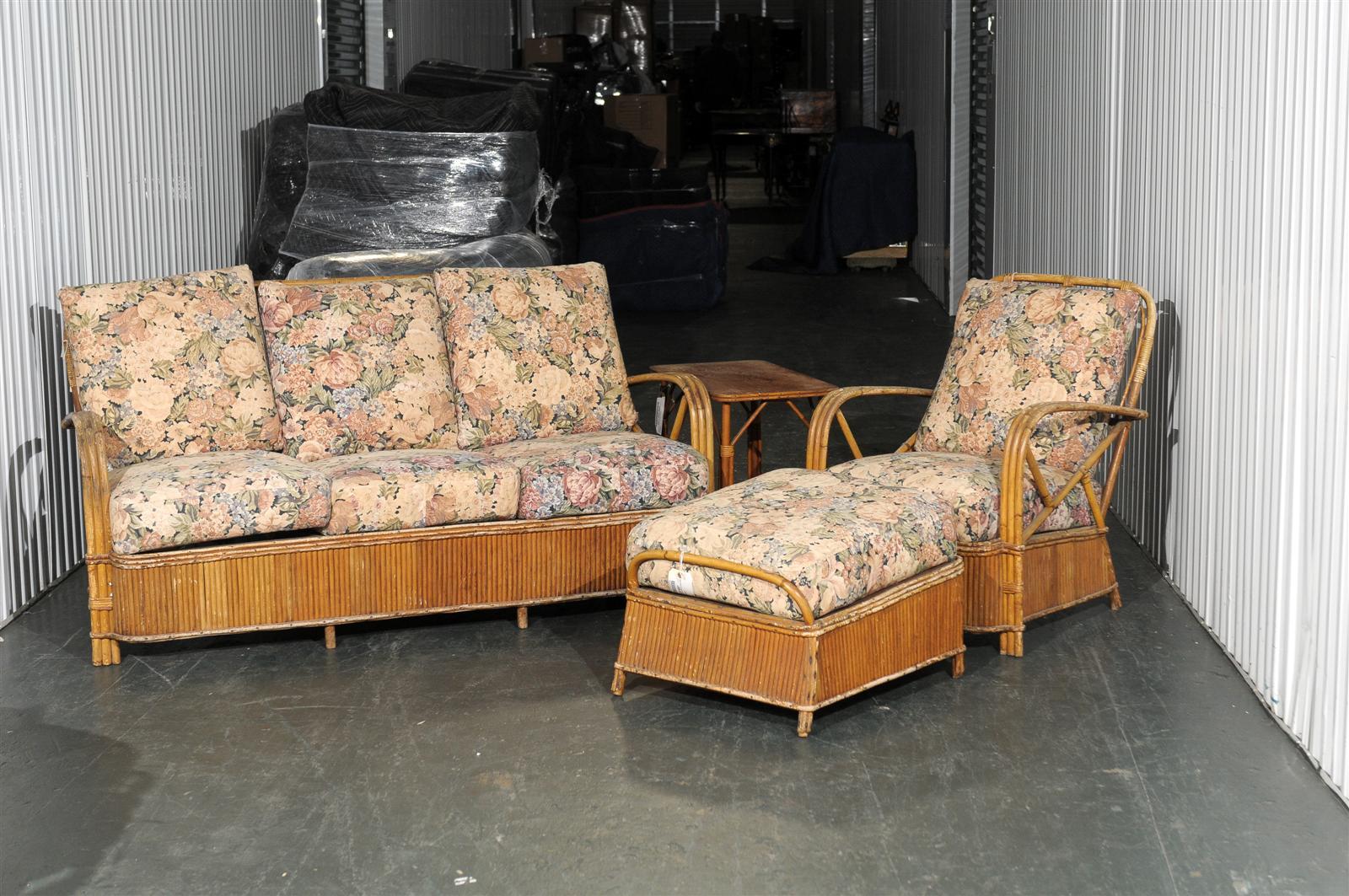20th century five-piece rattan set in the style of Frankl
Measures: Frankl sofa 64.75