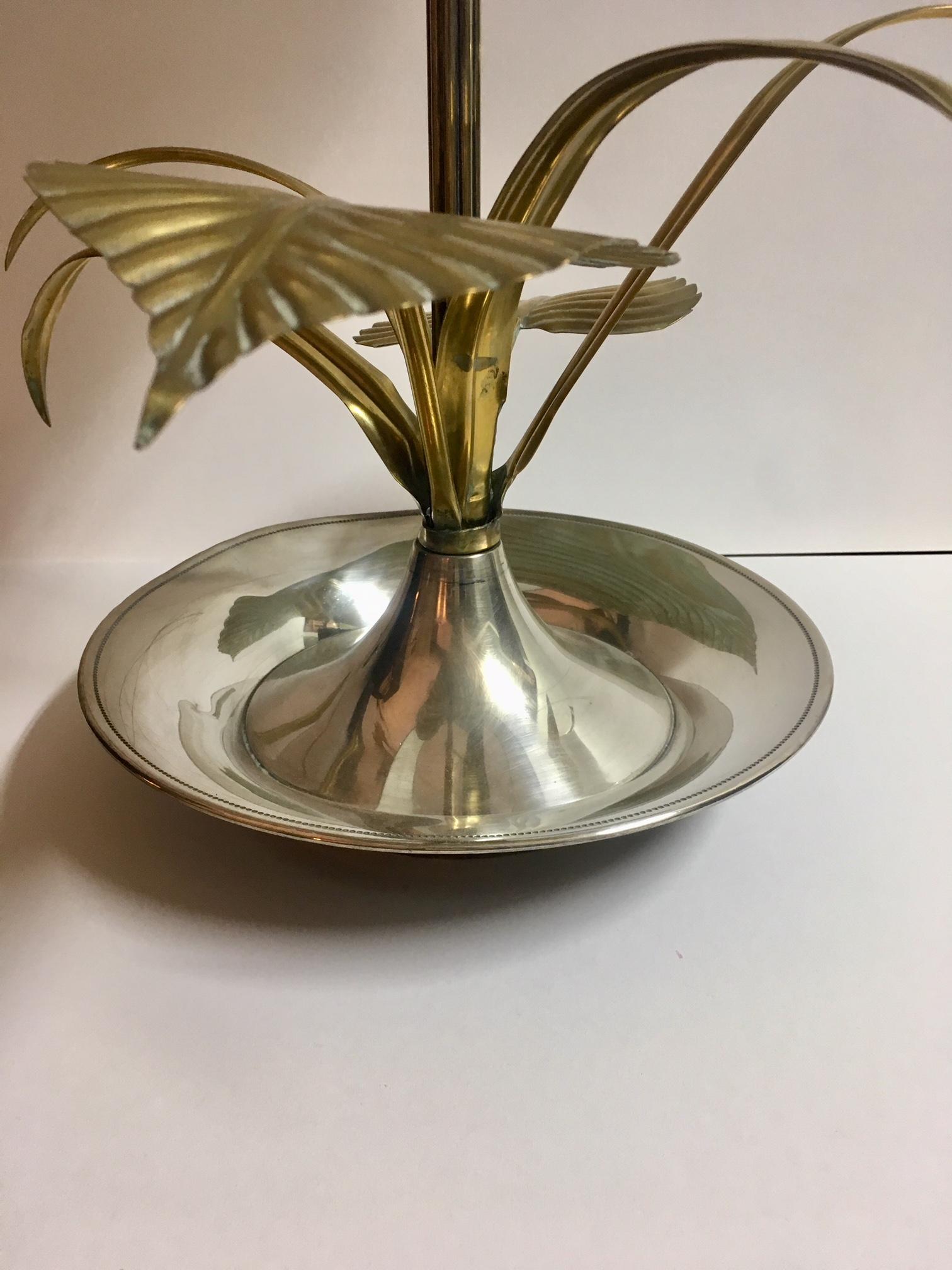 Flower table lamp made in high quality brass depicting a lotus flower and foliage, renovated and new electrical wiring, with two points of light, lampshade screen in silk and velvet.