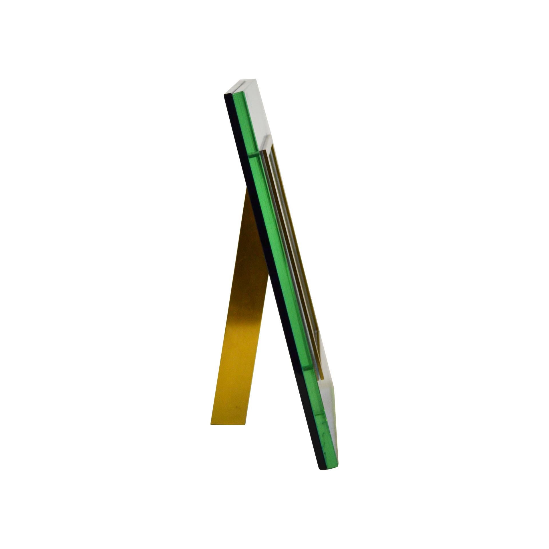 Picture frame by Fontana Arte mod. n. 2426 designed in 1970s with ground crystal, colored crystal, brass frame. Published in Catalogue Fontana Arte, 1972. Dimensions of the frame: 17.5 x 12.5 cm.