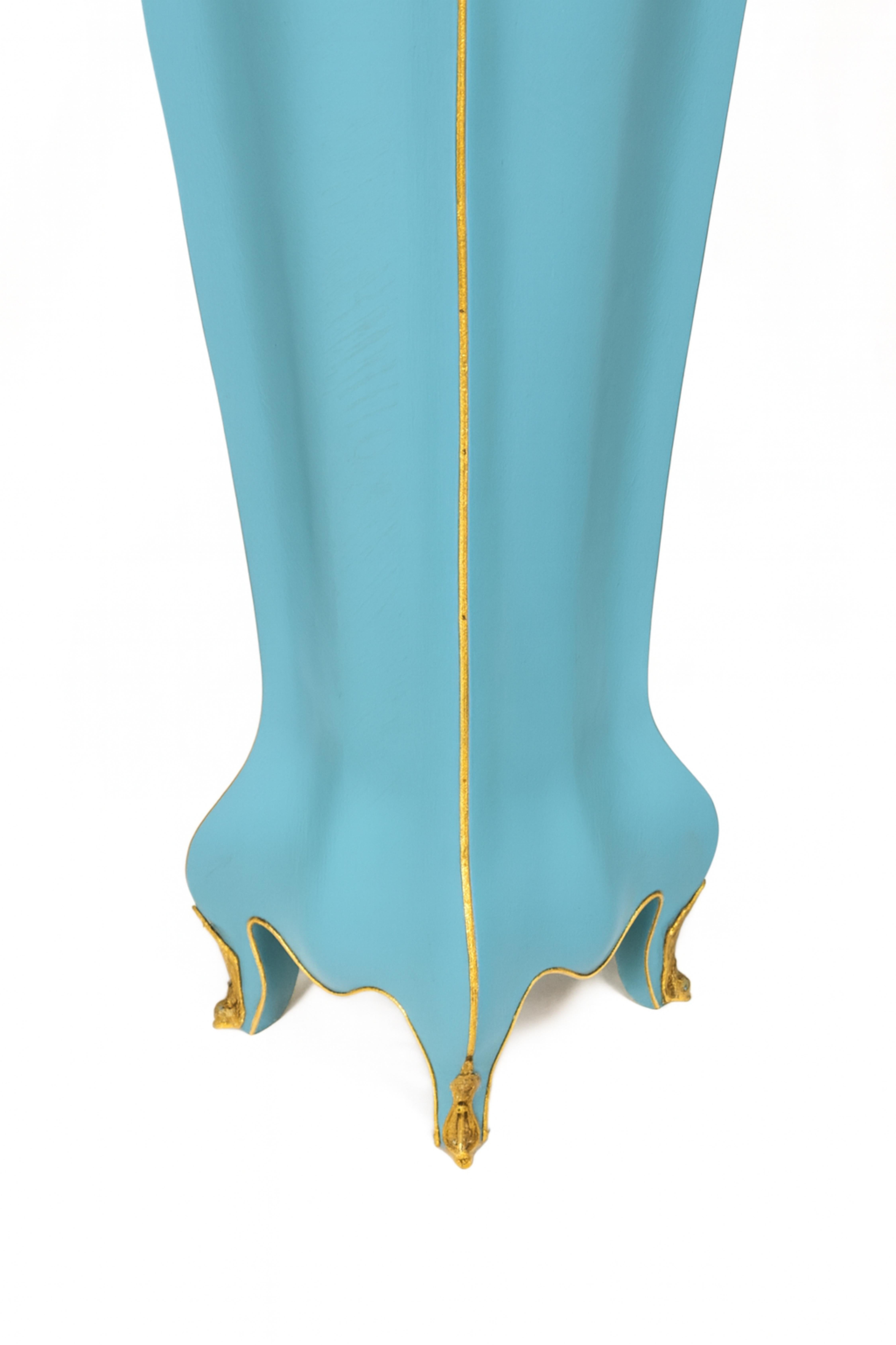 A vibrant pedestal showcasing marble tops, parquetry-patterned curving faces and short feet. 
The decoration is expressive yet refined, combining Louis XV style with Louis XVI refinement. 
The faces feature a  in a sleek refinished work in blue egg