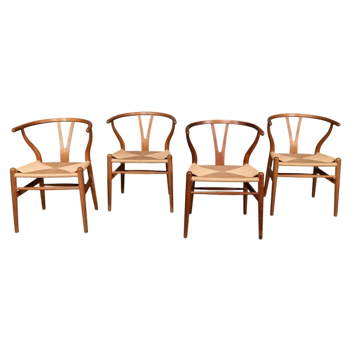 20th Century Four Wishbone Dining Chairs by Hans J Wegners, circa 1960