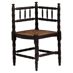 20th Century France Weathered Dark Oak Rush-Seated Spindle-Back Chair