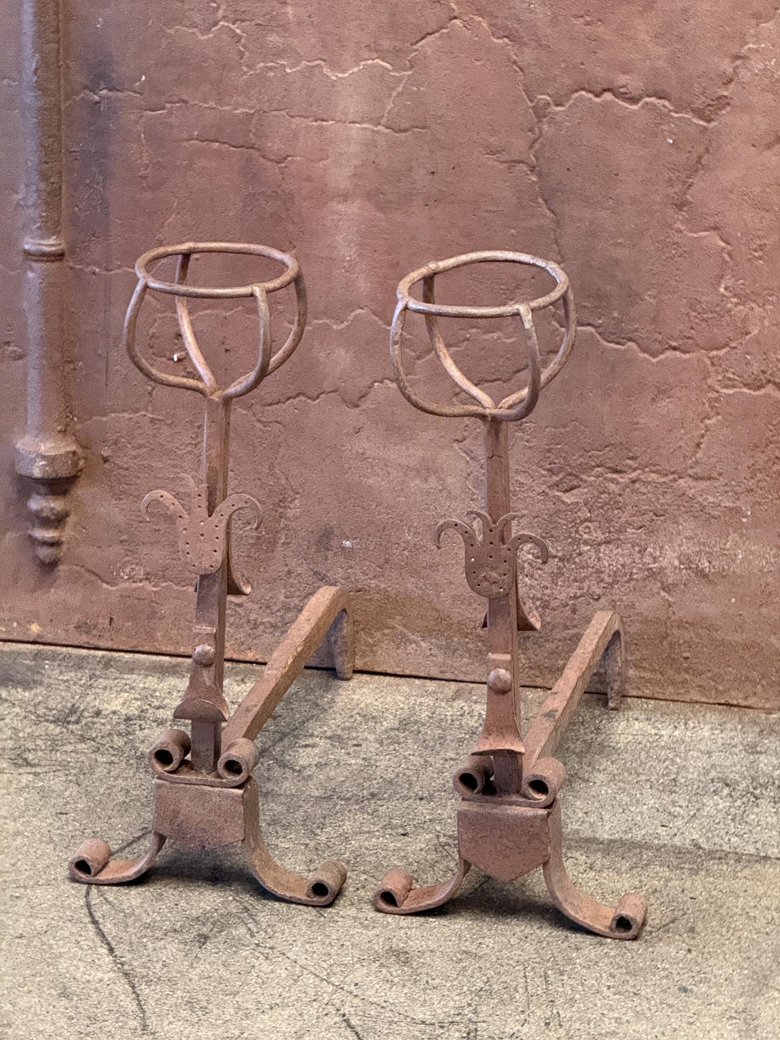 20th century French andirons or firedogs in the Gothic Style. The condition is good.