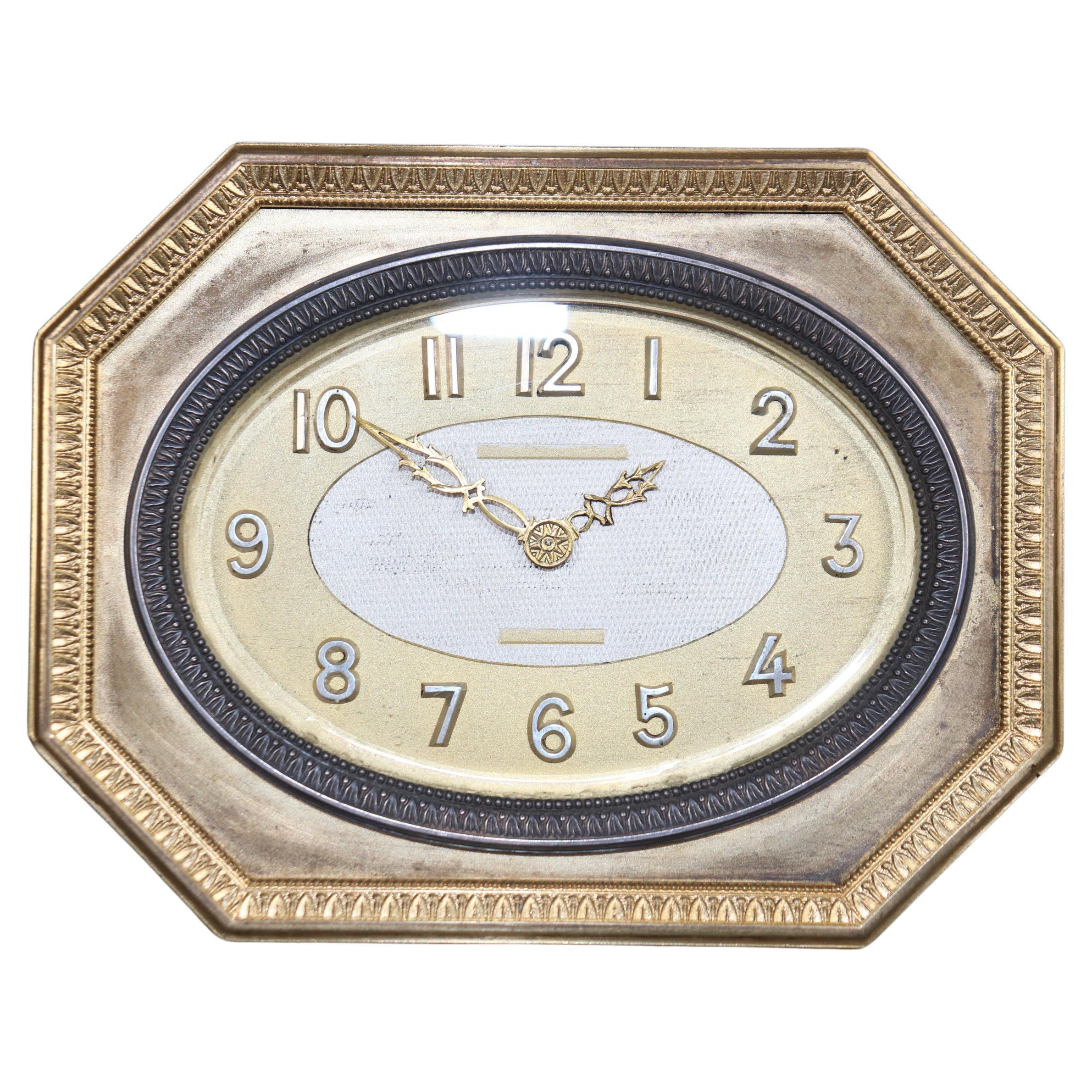 Orologio da tavolo Art Deco francese del XX secolo in bronzo e ormeggio
