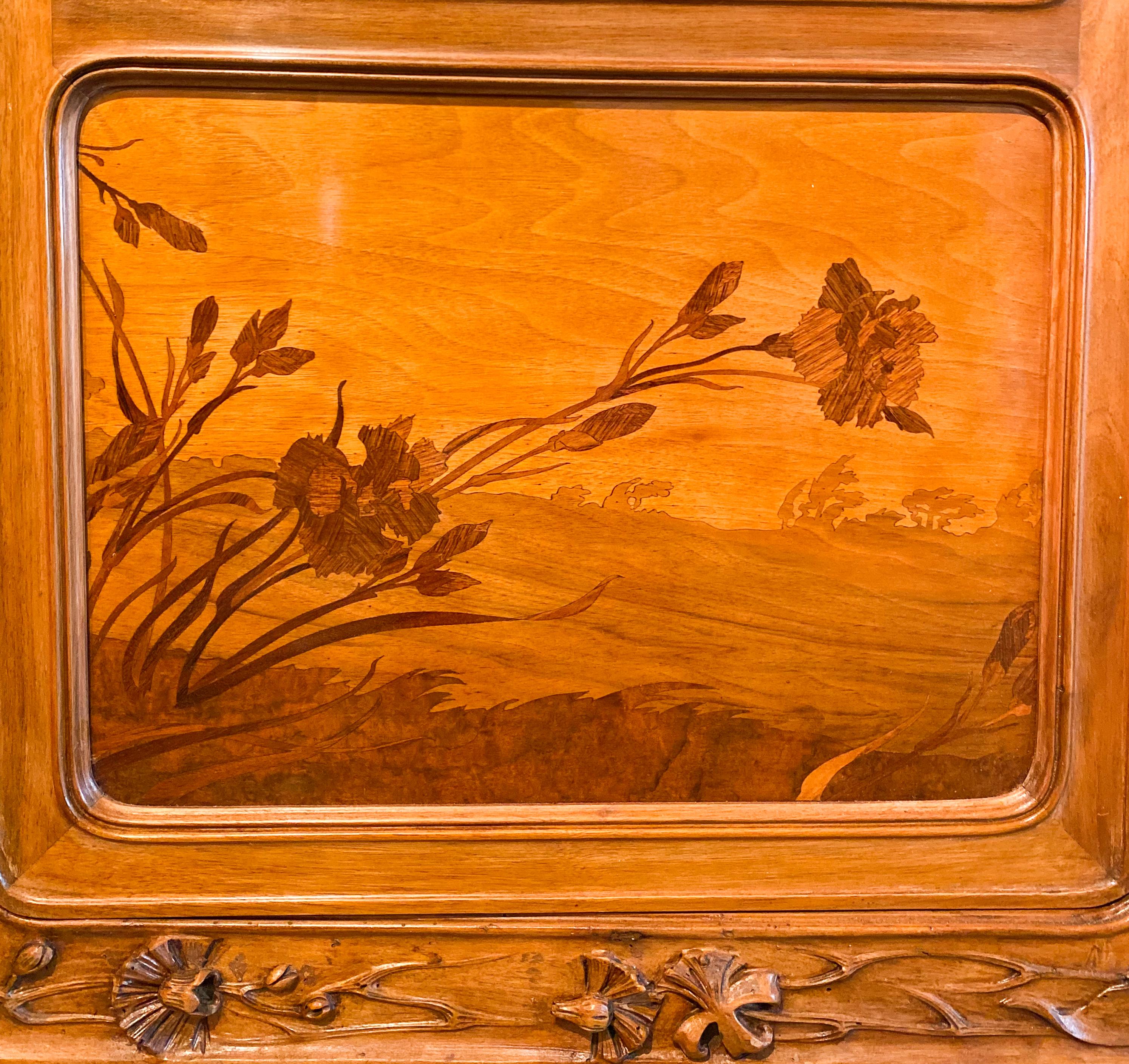 An early 20th century fine and rare French Art Nouveau carved and inlaid Marquetry 