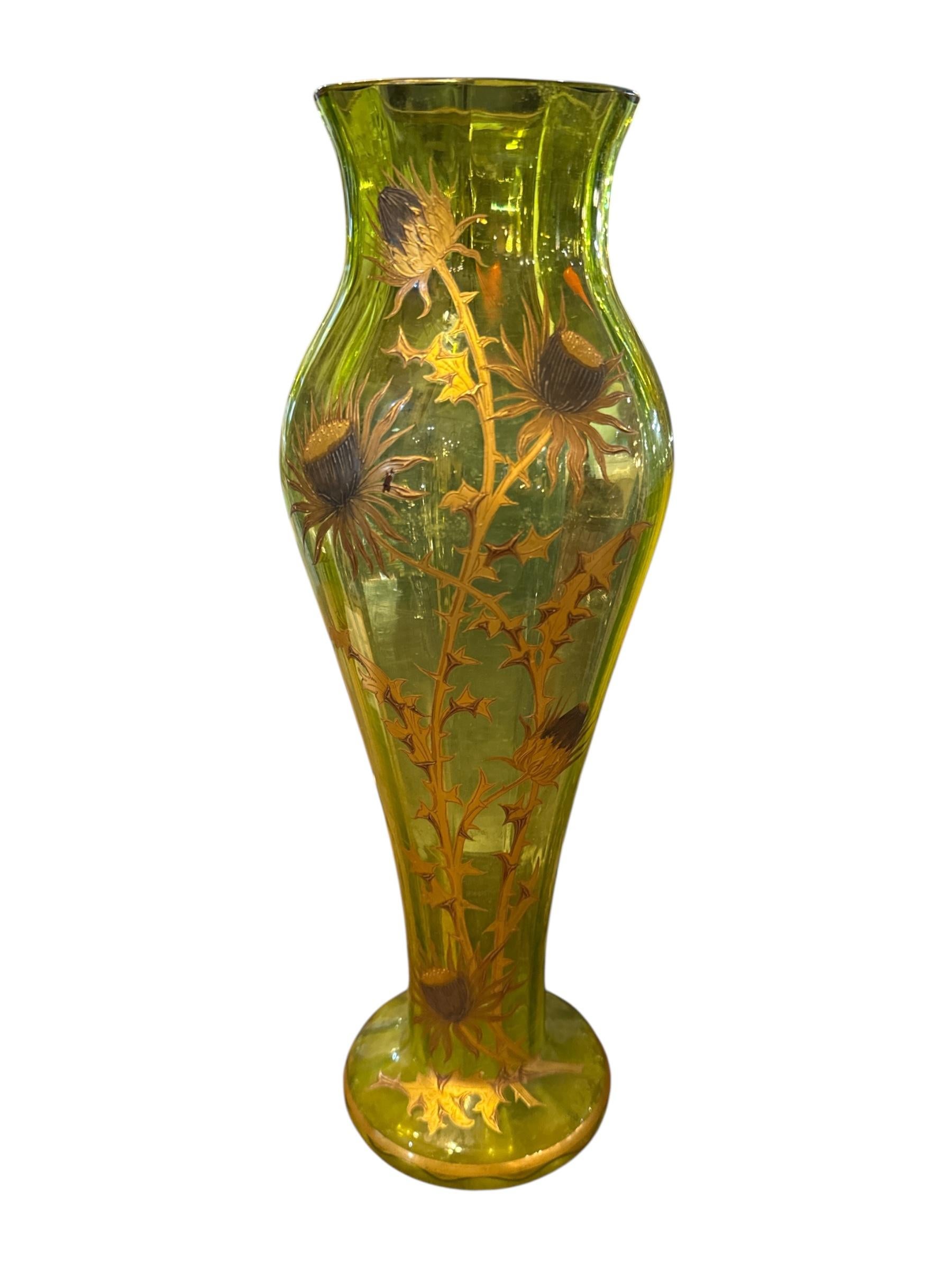 Celebrate the timeless elegance of Art Nouveau with this exquisite 20th Century French vase. Crafted from vibrant chartreuse green glass, the piece showcases a graceful flared silhouette with subtle ribbing that catches and reflects light