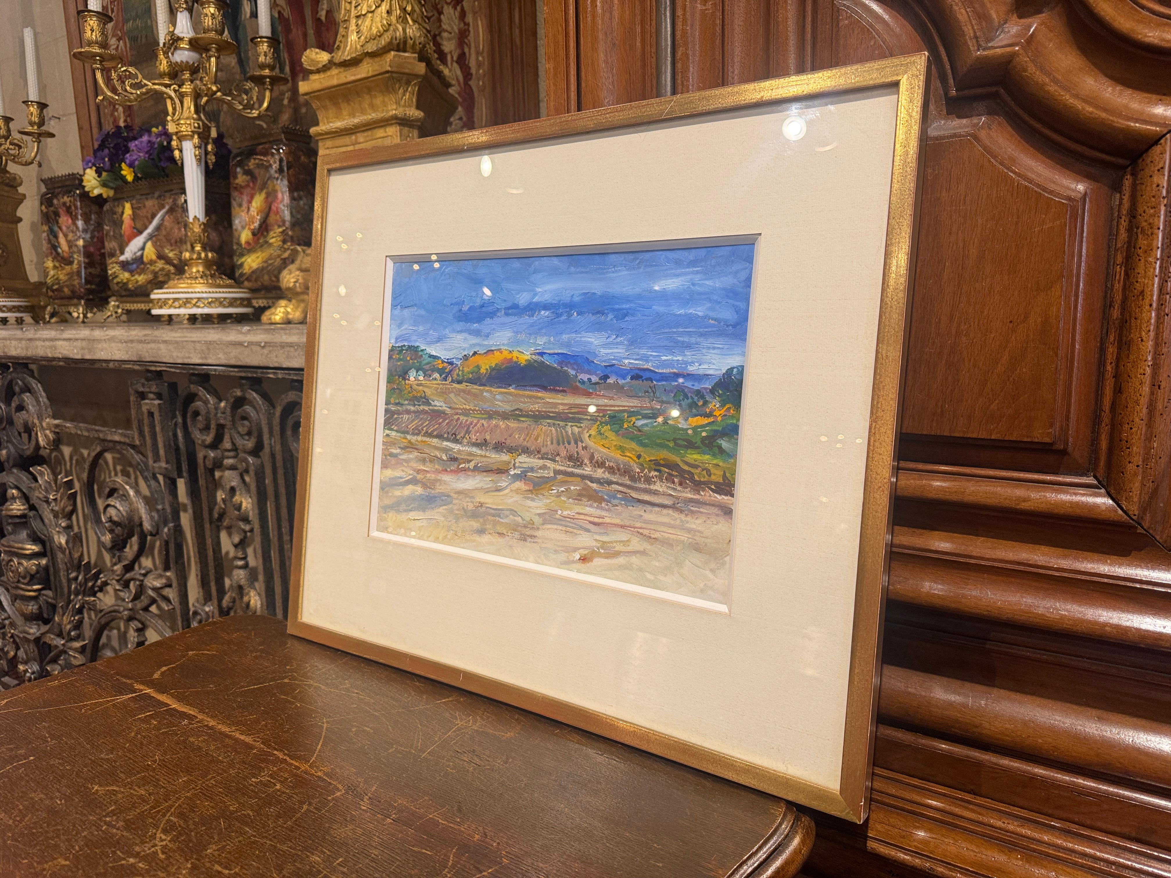Decorate a wall with this colorful vintage painting. Created in France circa 1974, and attributed to artist André Barrière (1918–1975), the piece is housed in a classic gilded frame with protective glass, preserving its vivid colors and dynamic