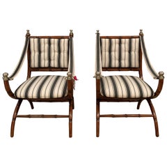 Paire de fauteuils en faux bambou sur pieds arqués, attribués à la Maison Jansen