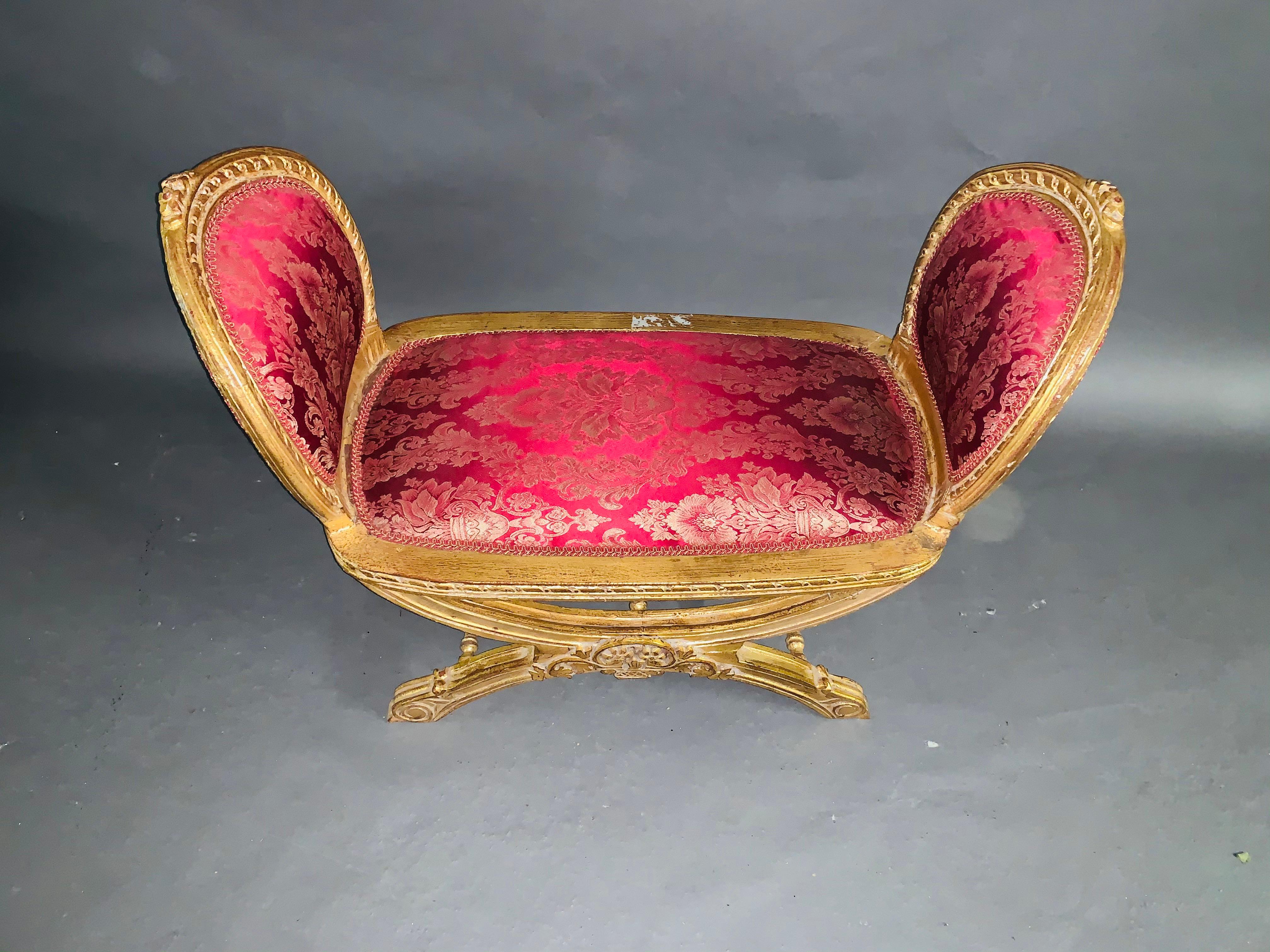 French bench, Gondola in the Louis Seize XVI Solid beechwood, gilded with gold-plated trim, snug curly frame on four curved legs. The seat is finished with a historical, Classic upholstery. 

Measures: Height 82 cm
Width 99 cm
Depth 49 cm
Seat