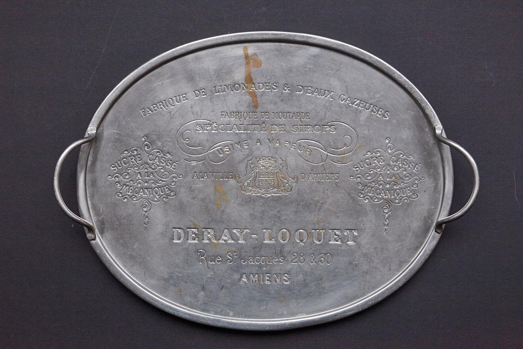 20th century French oval bistro tray engraved with local advertising from the town of Amiens.
Originally zinc over nickel, which starts to vanish, great patina and in it's original condition. 
Very sturdy construction.
