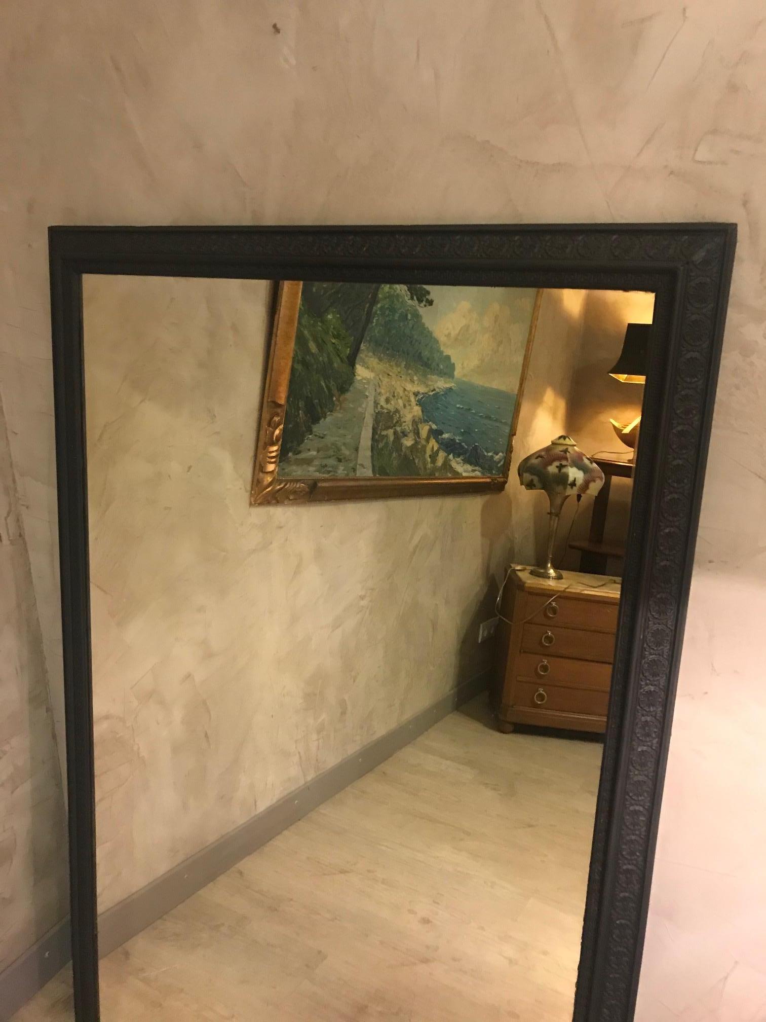 Very nice 20th century French mirror from the 1900s. Has been painted in mat black and waxed.
Elegant and pure line. Ideal in a bedroom or in a living room on a fireplace.
Nice quality and condition.