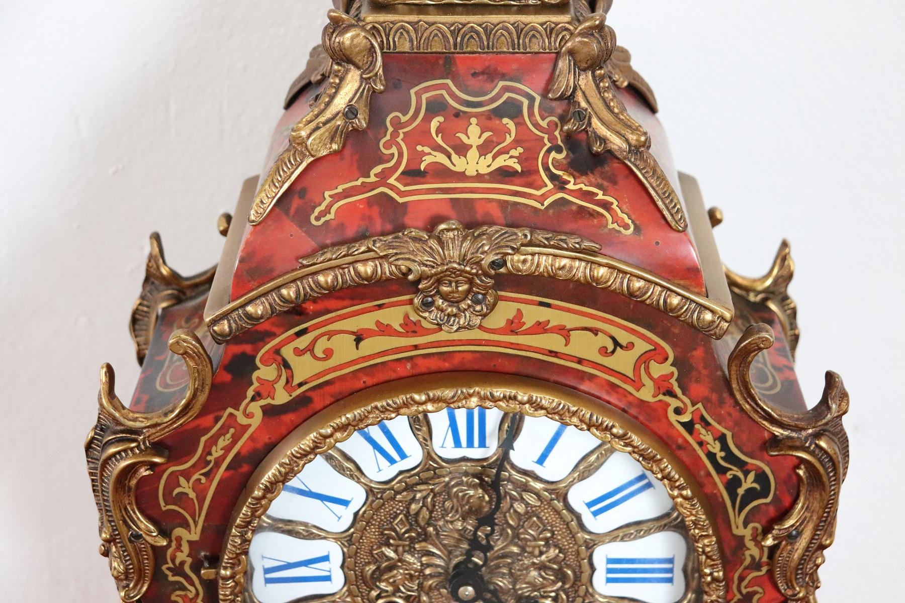 Rare and fine quality French Louis XV style boulle, circa 1920s red tortoiseshell and brass inlaid table clock. The clock has very good quality bronze gilt ormolu mounts. Perfect condition.