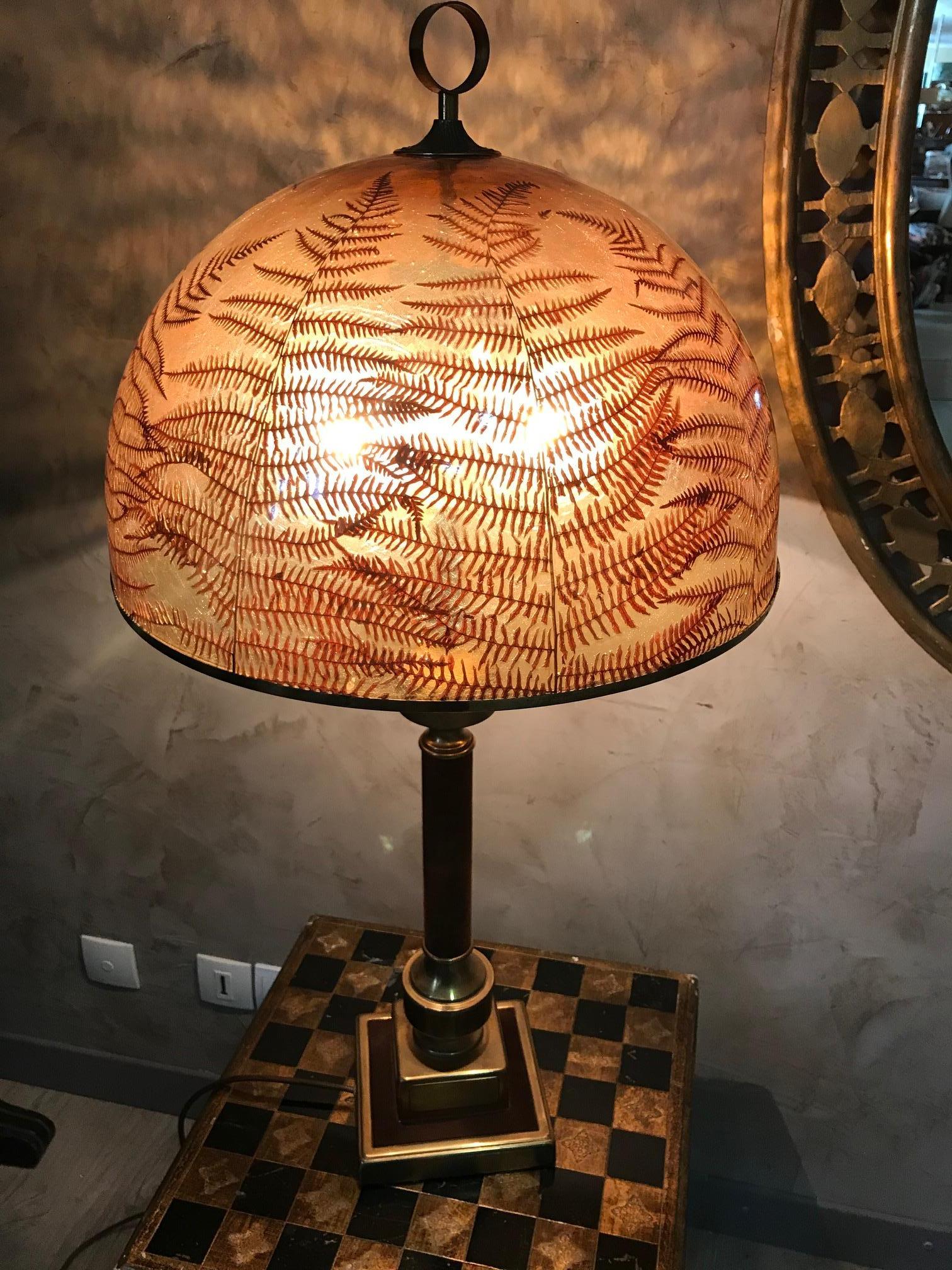 Beautiful 20th century French brass table lamp from the 1970s.
The lampshade is made with real ferns covered with resin.
The base is made with brass and Alcantare fabric.
Very good condition and quality.
   