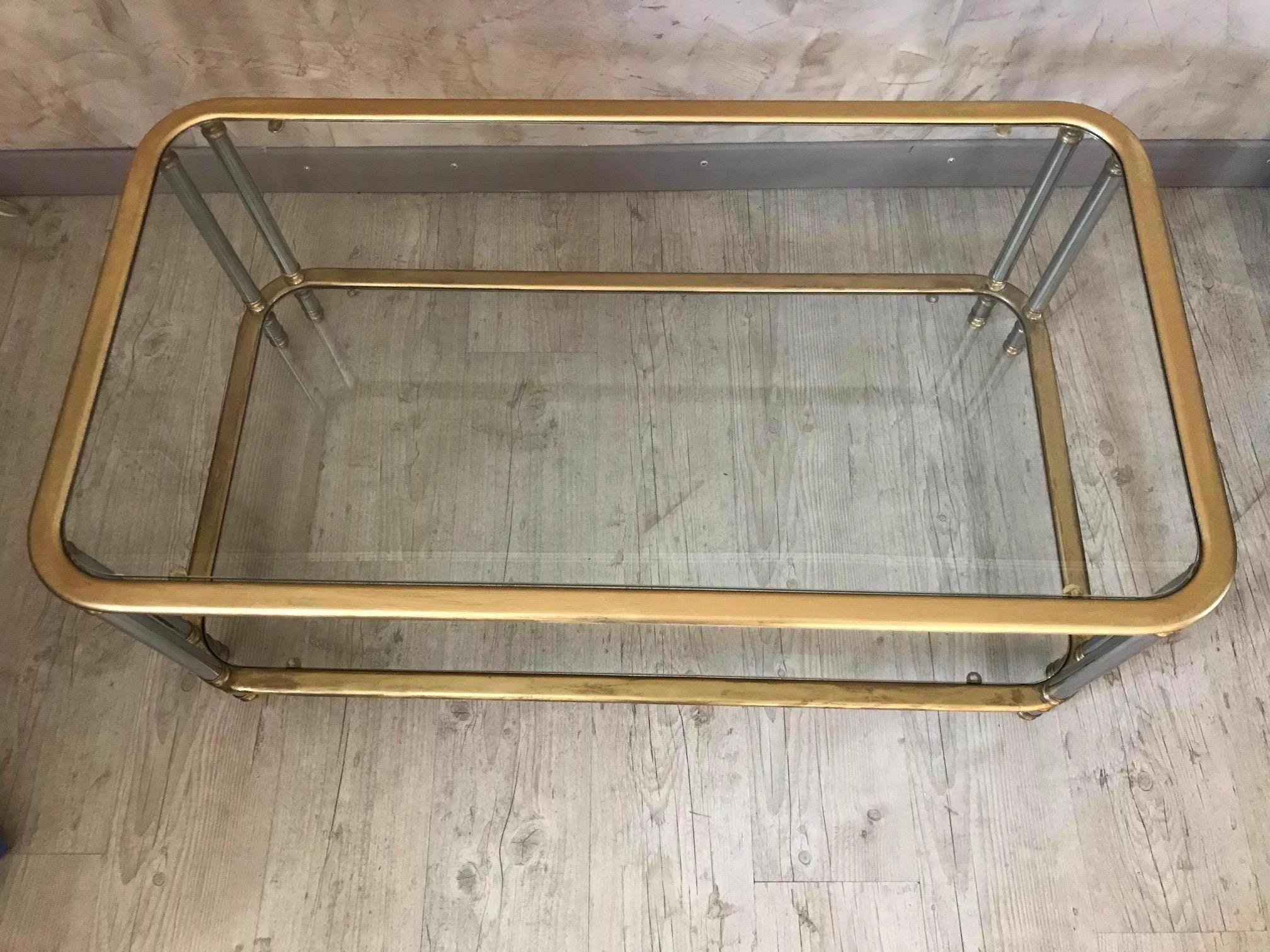 Beautiful 20th century French brass, chromed metal and glass coffee table from the 1970s.
The two glasses top are removable. In the style of Romeo Rega.
Very nice quality. Good dimension, ideal in a large living room.