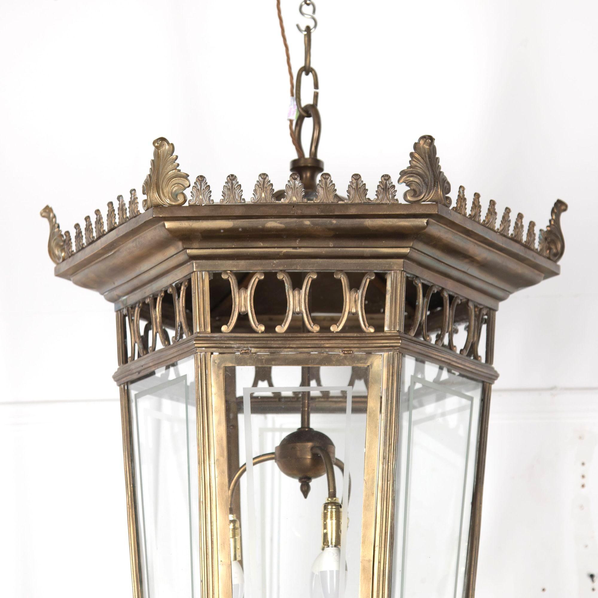 Impressive 20th century French brass lantern of large proportion.
This lantern is of good quality with etched glass panels, and an opening door, and has been rewired with three bulb holders.