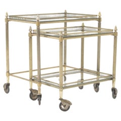 20th Century French Brass Nesting Tables With Glass Tops On Wheels