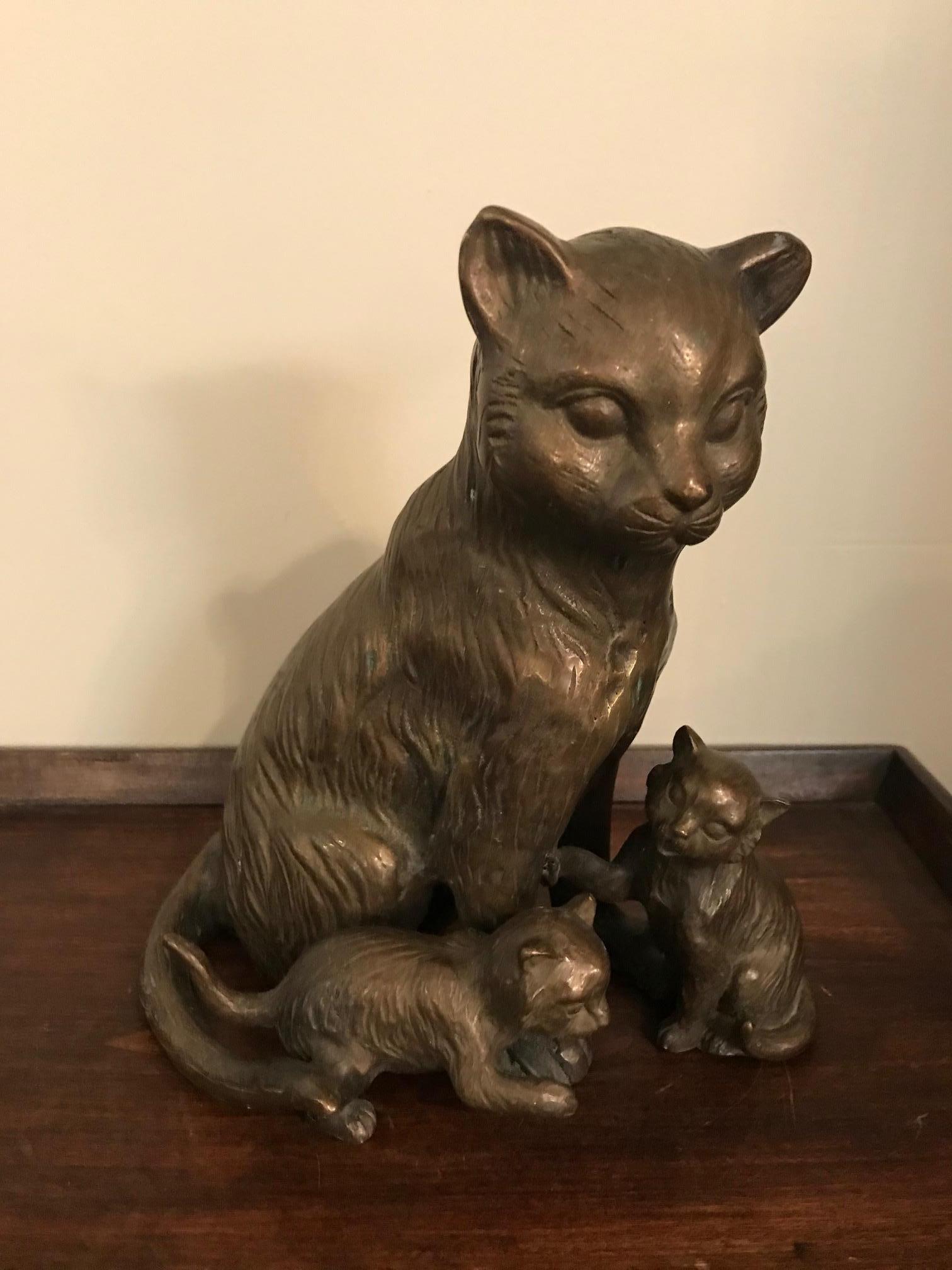 Very nice 20th century French bronze cats sculpture from the 1960s. 
A cat and her two kitten playing.
 