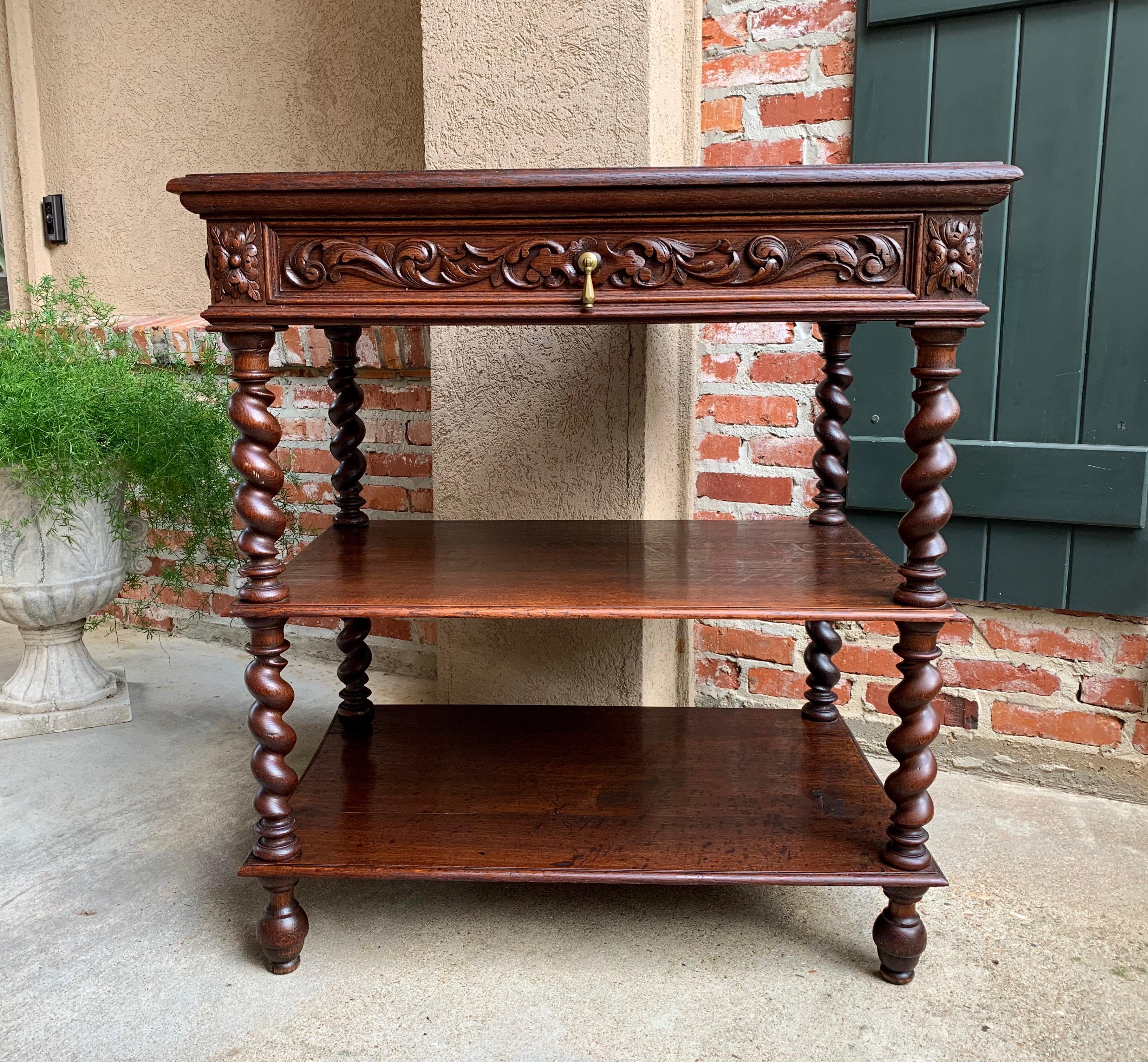 Direct from France, a lovely antique French sideboard/display bookcase/shelf/server, in a very versatile size!~
~Full length front drawer with carved Black Forest style carved foliage; carved keystone corners/ carved foliage on side aprons as