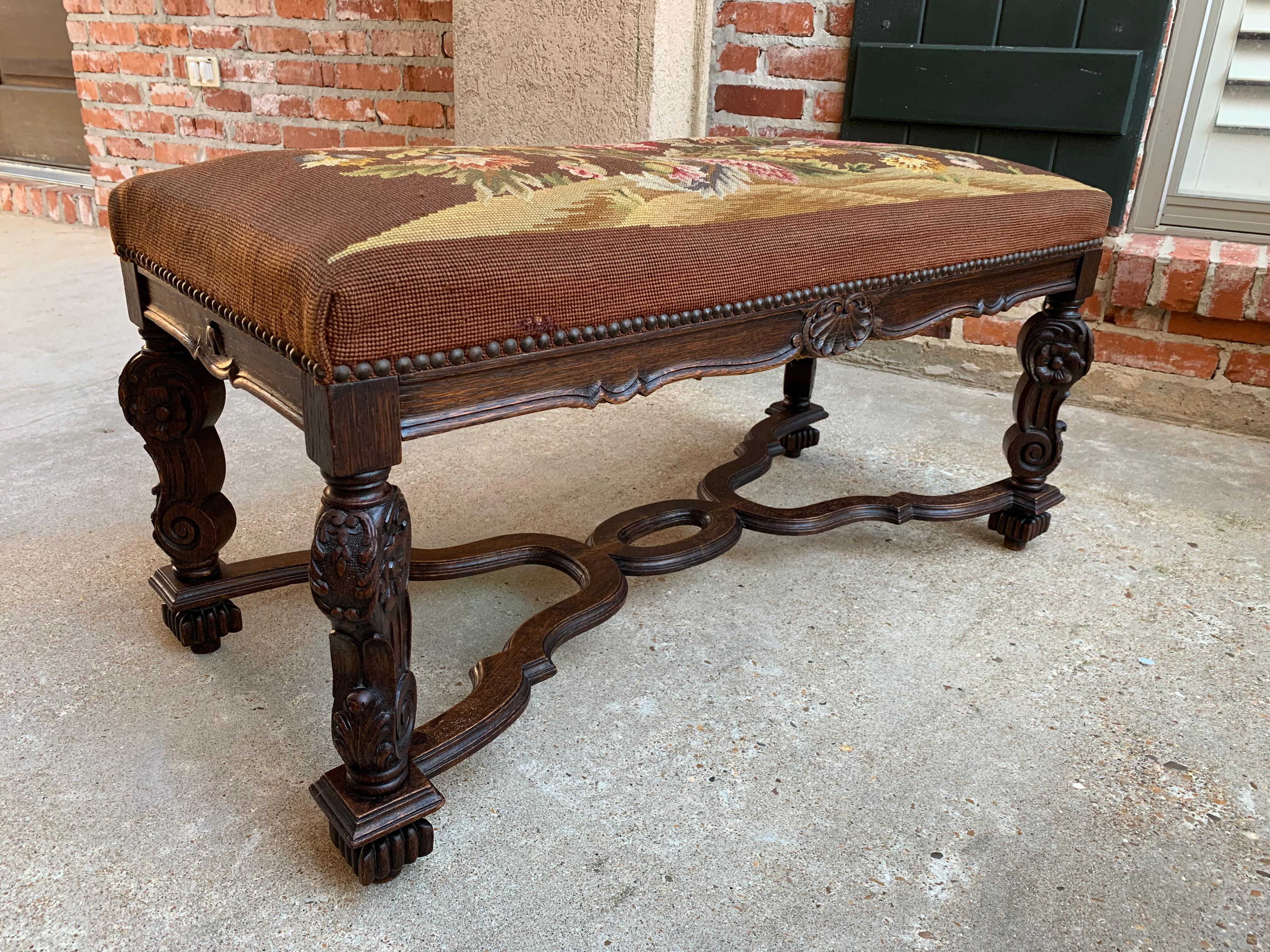 Direct from France, one of several great antique stools, tabourets, and benches from our most recent container!
~ Fabulous French Louis XV style with heavily carved legs and hand carved serpentine apron on all sides
~ Wide beveled serpentine cross