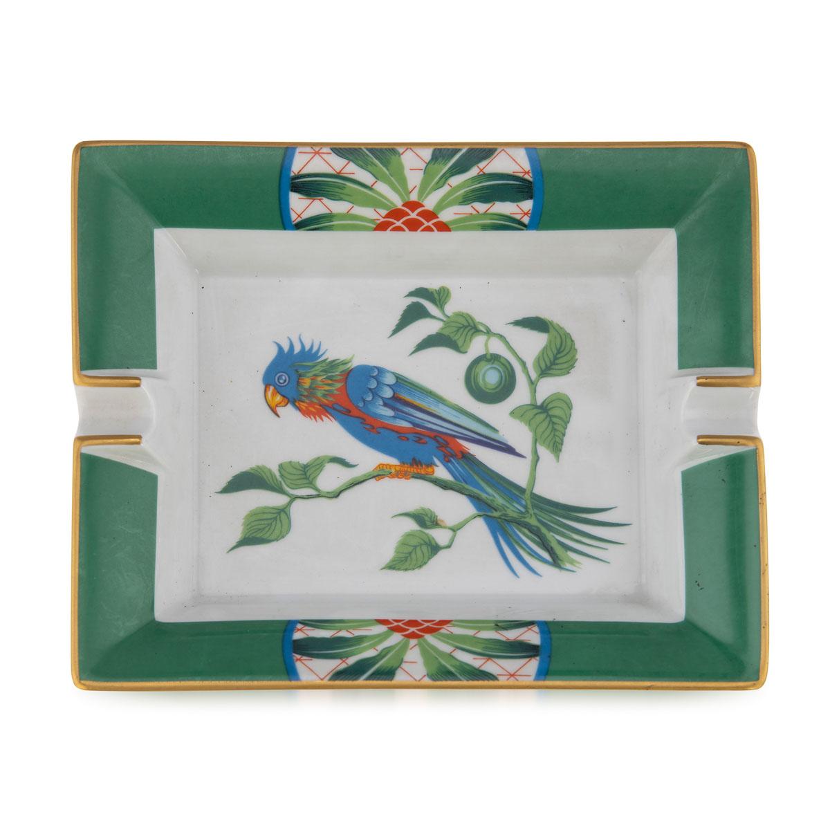 A ceramic ashtray by Hermes, made in France in the latter half of the 20th century. These ashtrays have always been very collectable with the vintage models in particular. This one has a lovely bird theme but at the same time typically Hermes; a