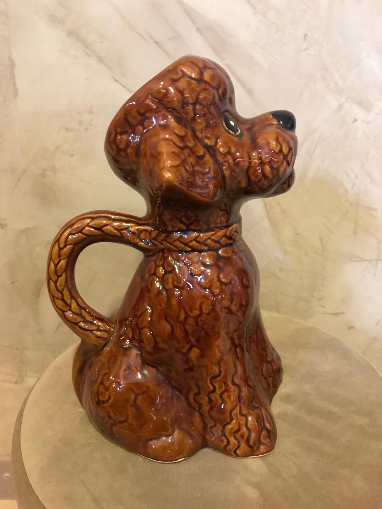 Very nice 20th century French ceramic Poodle pitcher from the 1950s. 
Large handle. 
Good quality and perfect condition.