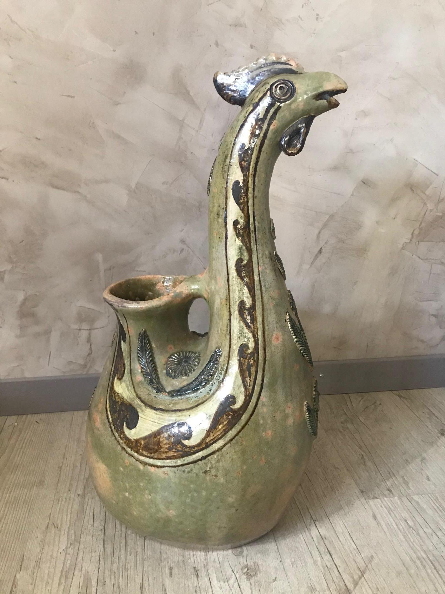 Beautiful 20th century French ceramic rooster amphora or Vase from the 1980s. 
Very original and beautiful ceramic work. 
Small crack on the rooster crest but not broken and another crack on the body but good general condition.
   