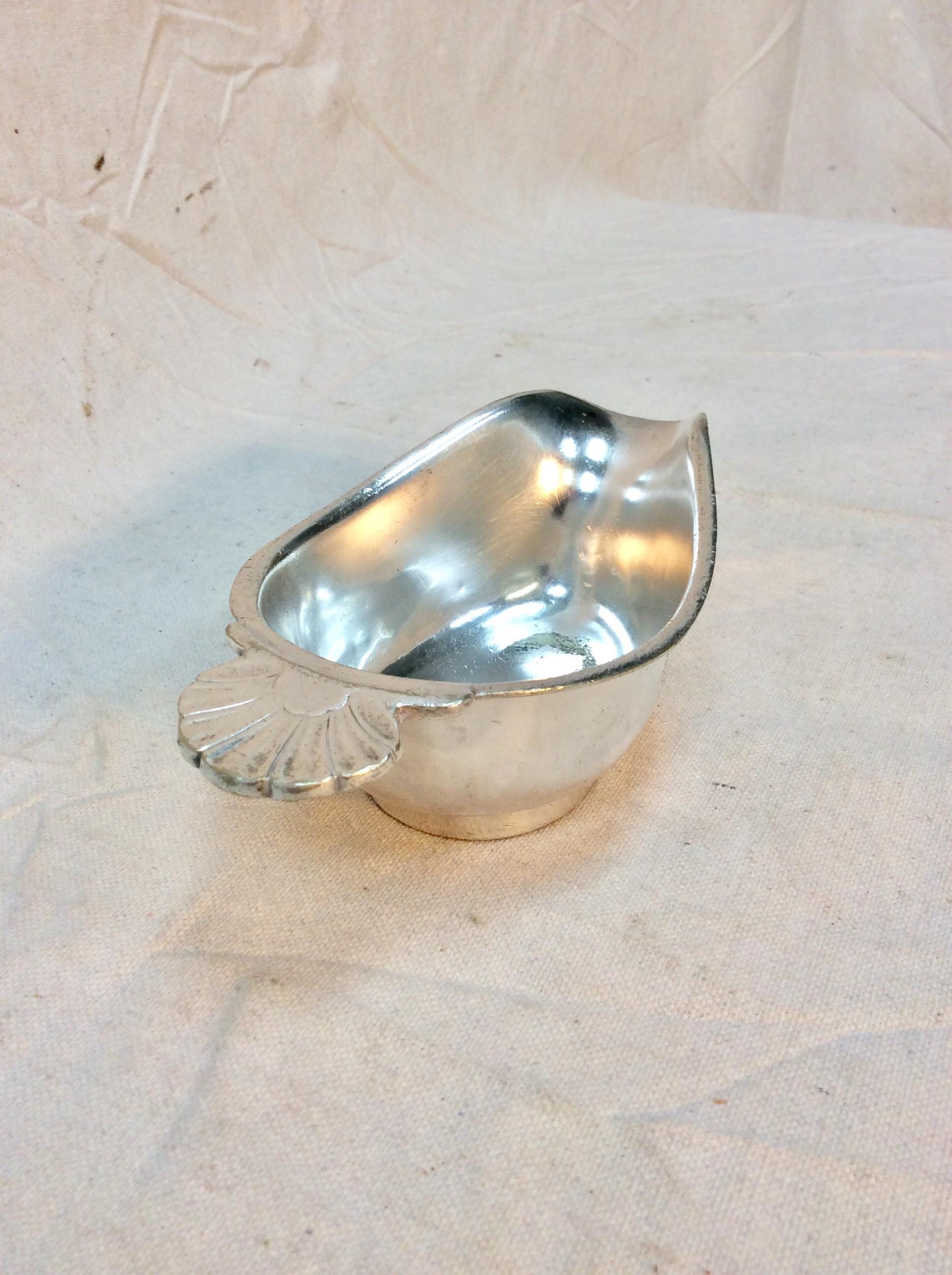 Found in the South of France, this 20th Century Hotel Silver Silverplate Sauce Boat was manufactured by Christofle and produced for the Hotel Provencal. The piece is hallmarked on the side with an emblem that is most likely the hotel logo with Hotel