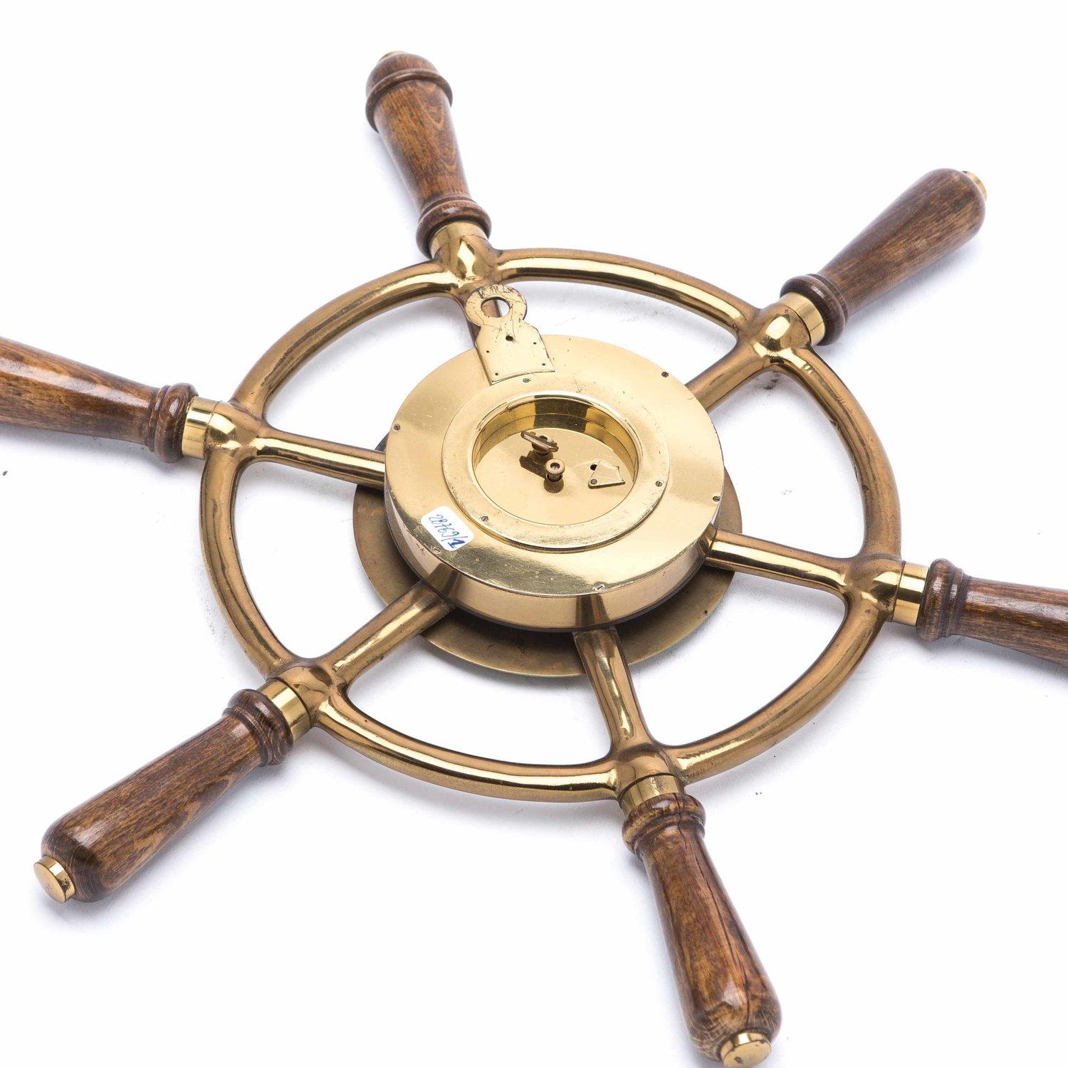 Rare and original vintage Hermes Paris “Gouvernail” ship’s wheel wall clock and matching barometer. The clock encases an 8-day mechanical movement, made probably by Jaeger Lecoultre (usually all Hermes clocks used JLC movements).

Hermes